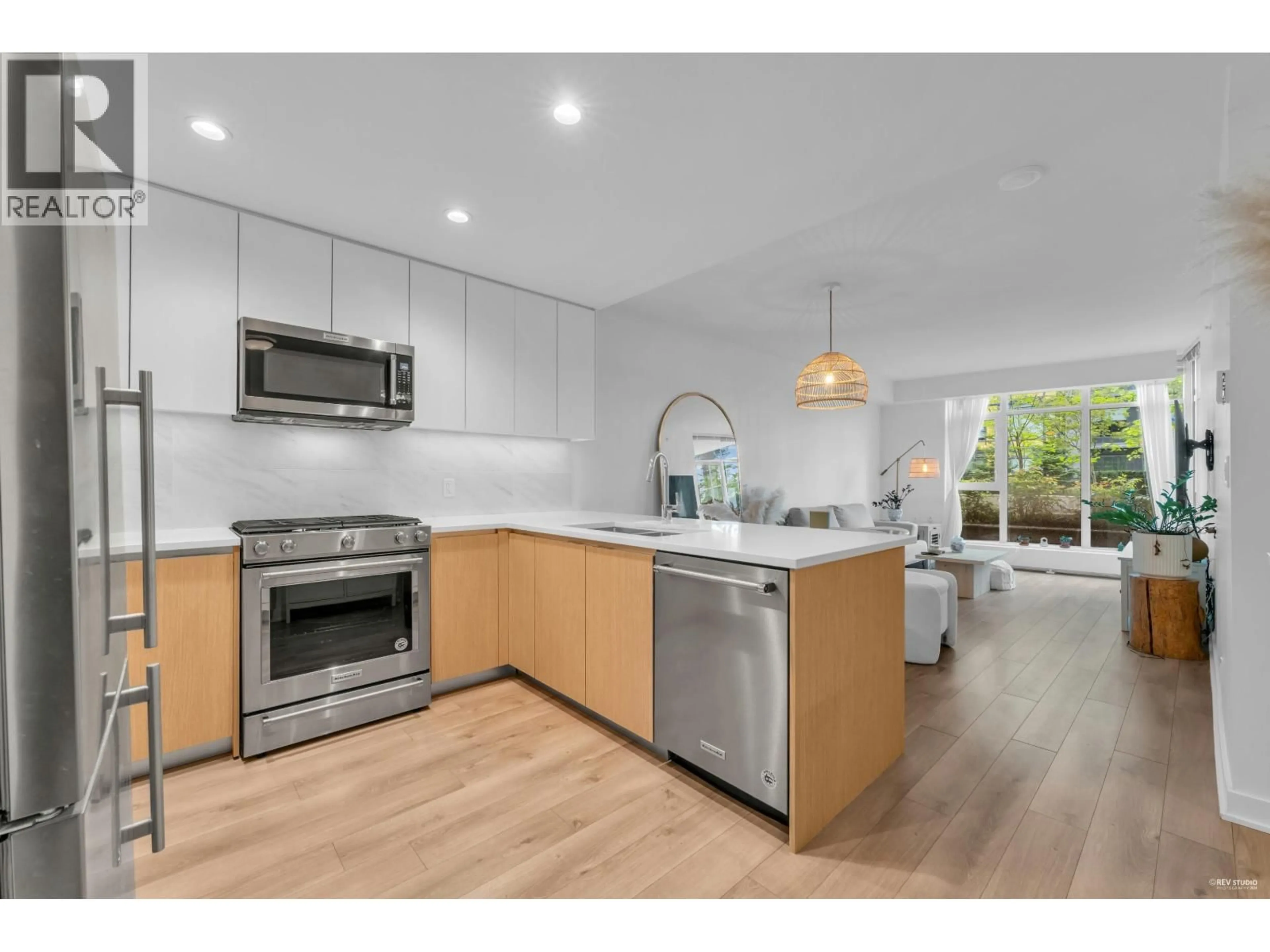 Open concept kitchen, unknown for 103 - 8940 UNIVERSITY CRESCENT, Burnaby British Columbia V5A0E7