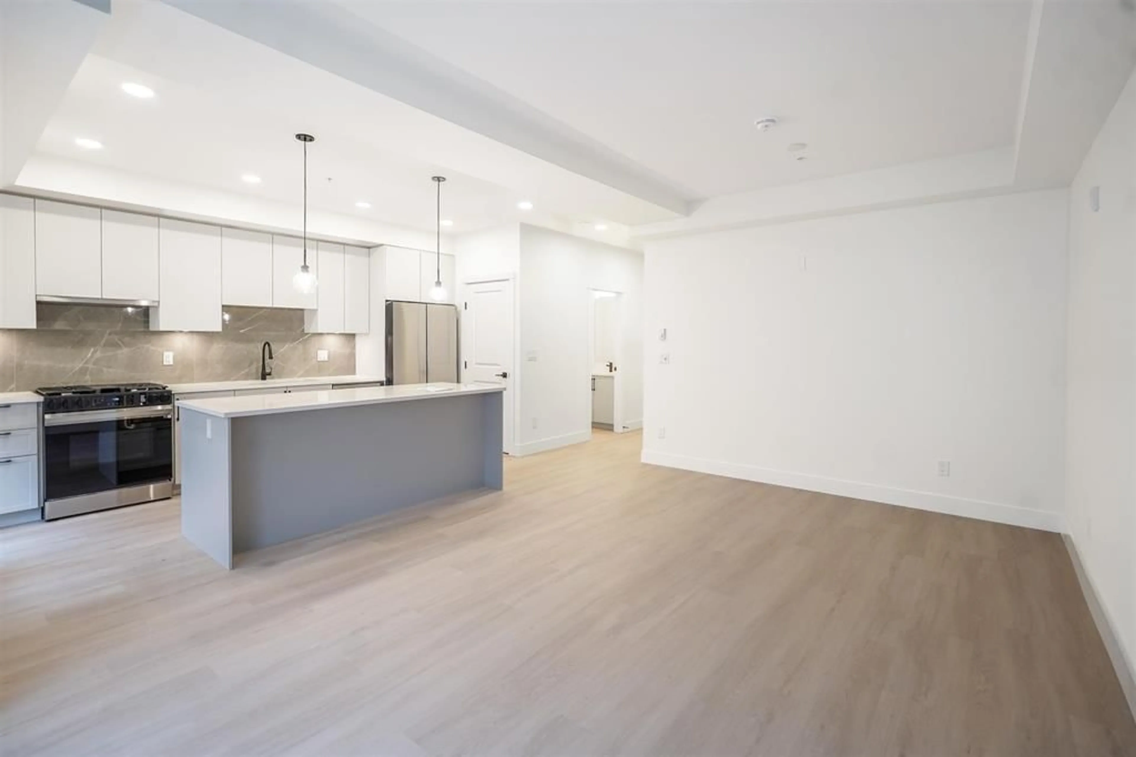 Open concept kitchen, unknown for 102 - 3528 146A STREET, Surrey British Columbia V4P0H4