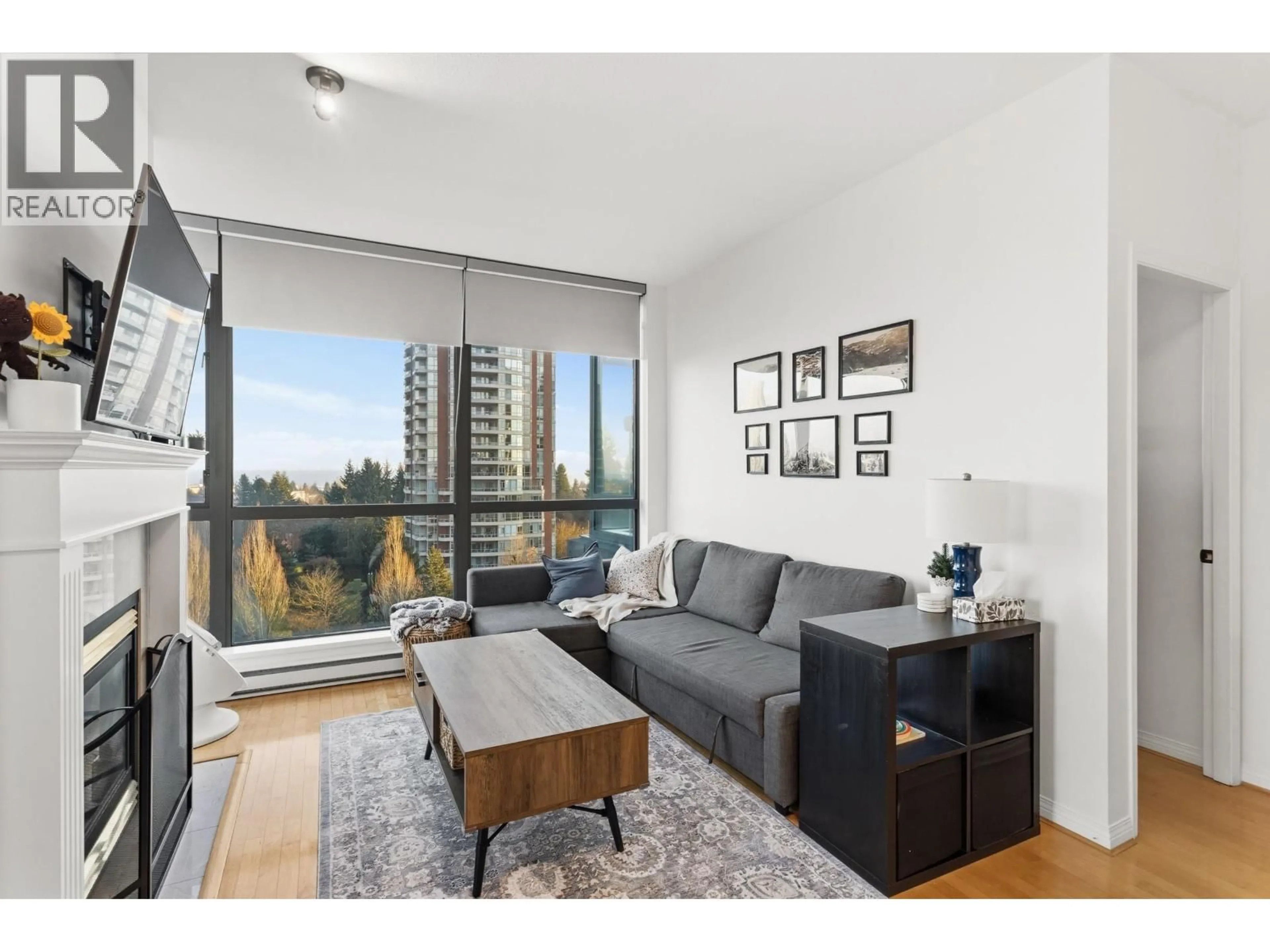 Living room with furniture, wood/laminate floor for 1003 - 6837 STATION HILL DRIVE, Burnaby British Columbia V3N5B7