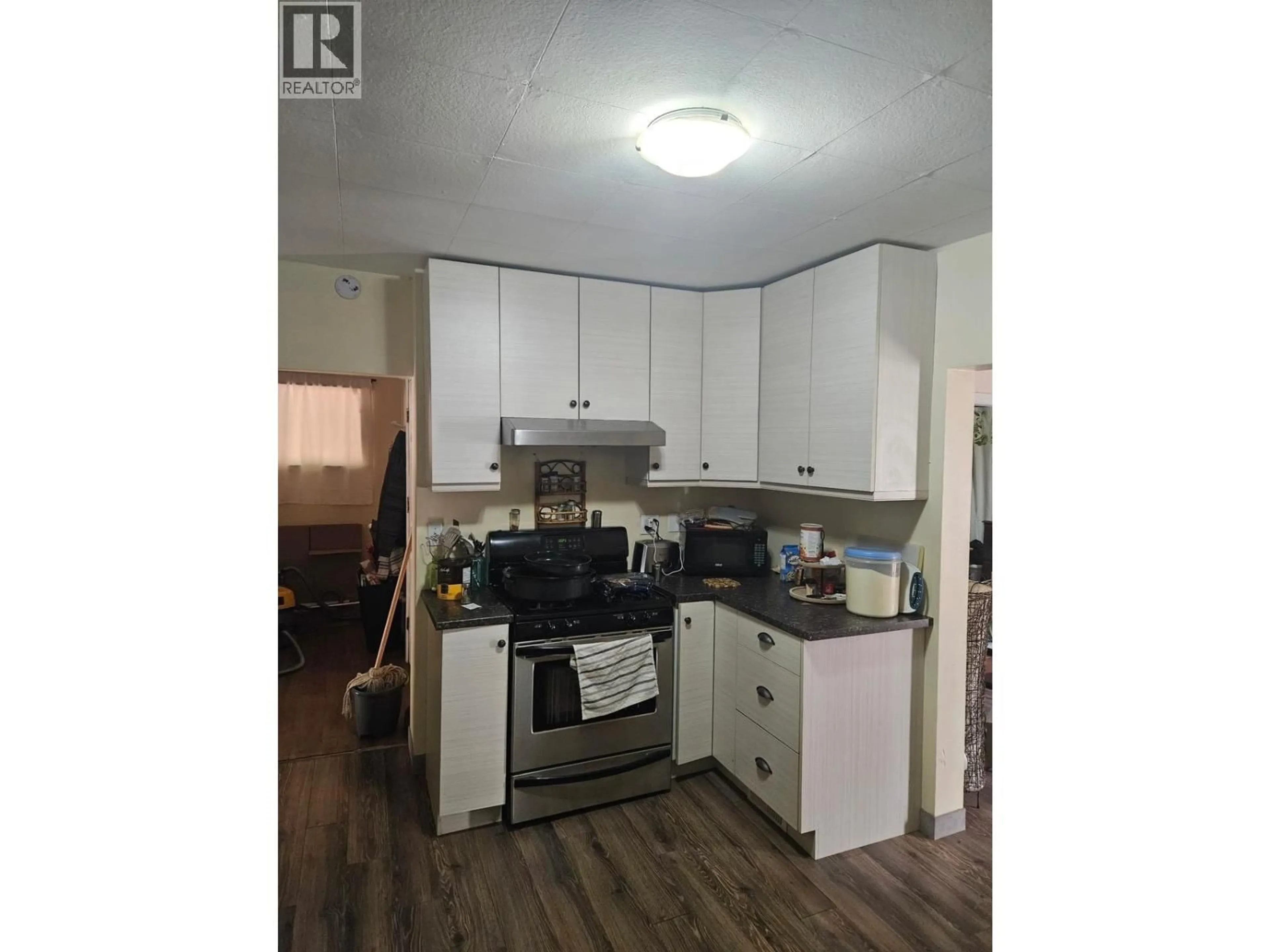 Standard kitchen, wood/laminate floor for 396 HOY LANE, Quesnel British Columbia V2J1X4