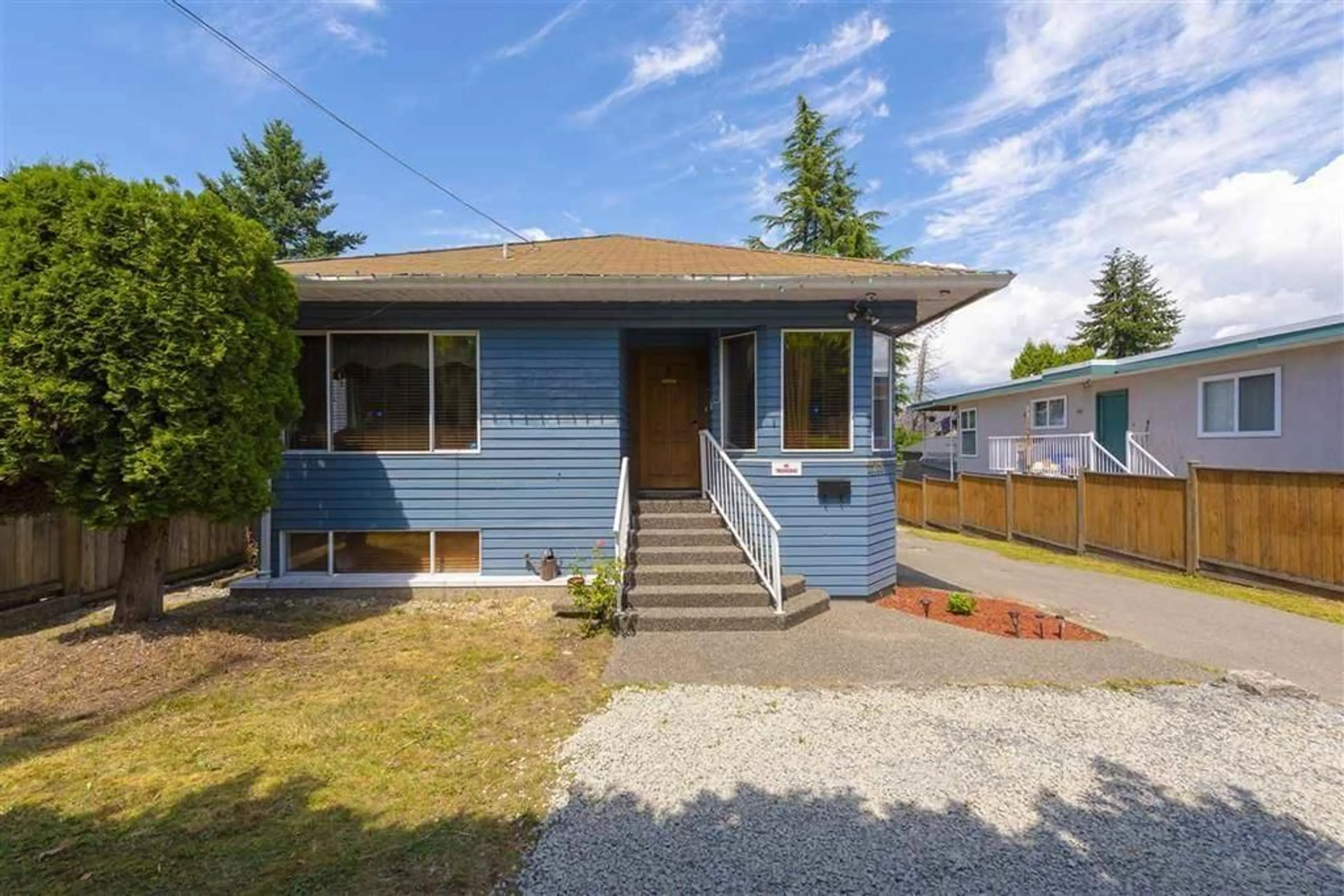 Home with vinyl exterior material, street for 11719 96 AVENUE, Surrey British Columbia V3V1V9