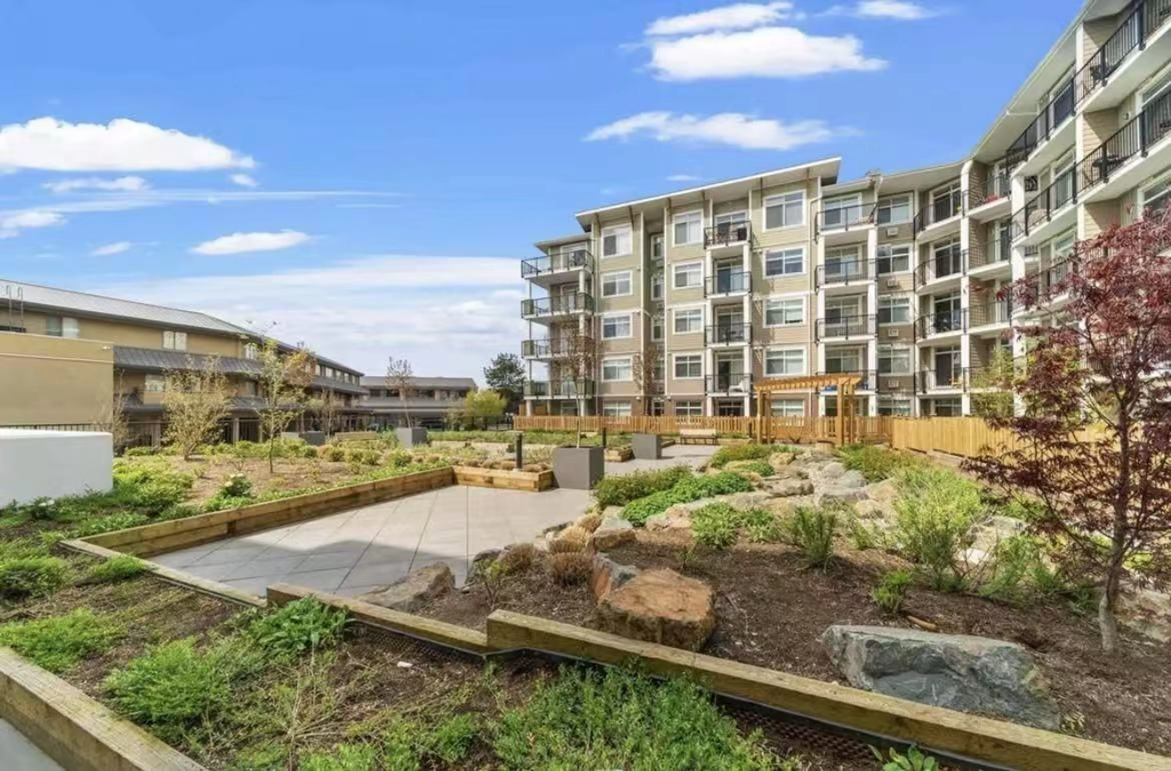 A pic from outside/outdoor area/front of a property/back of a property/a pic from drone, unknown for 401 - 20696 EASTLEIGH CRESCENT, Langley British Columbia V3A0M3