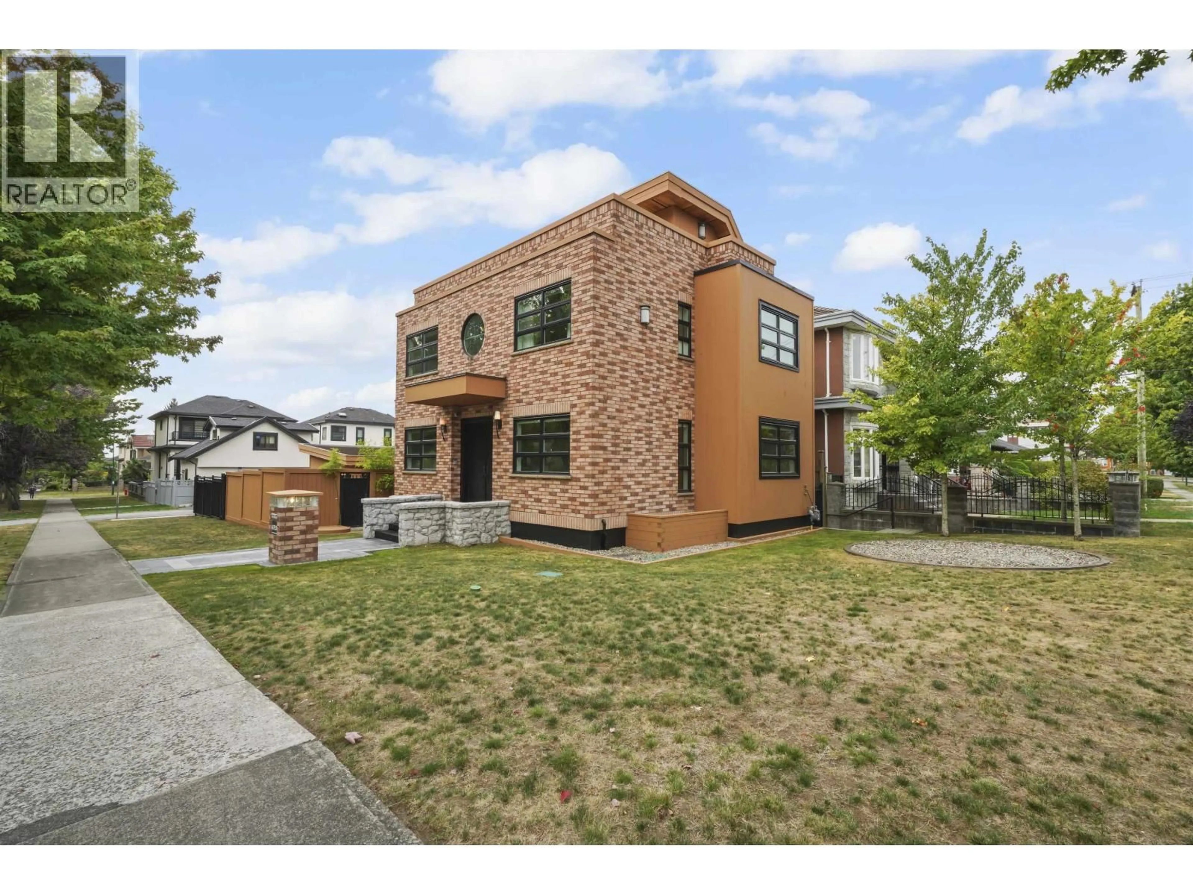 Home with brick exterior material, street for 6733 VIVIAN STREET, Vancouver British Columbia V5S2T7