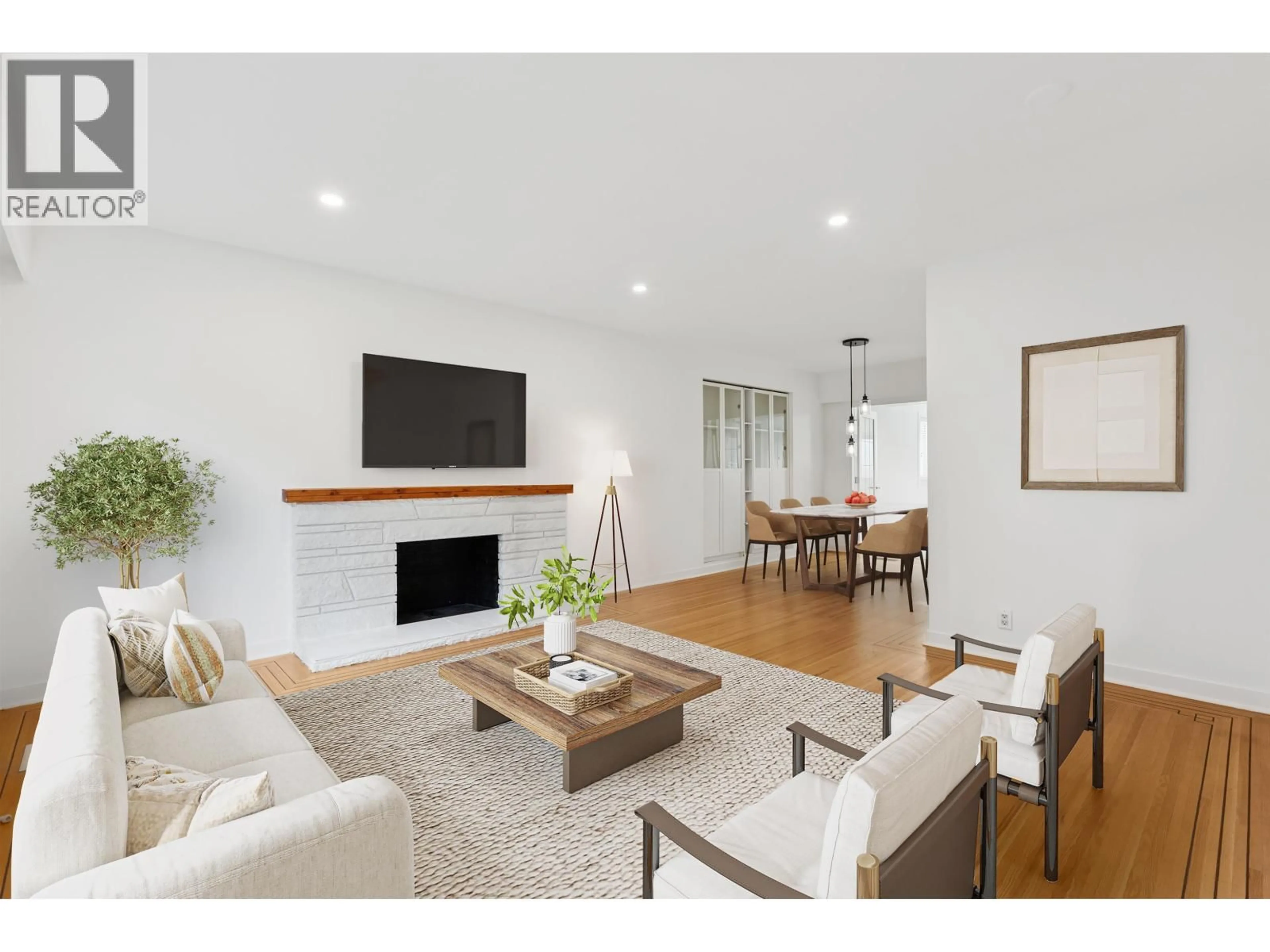 Living room with furniture, wood/laminate floor for 7477 VIVIAN DRIVE, Vancouver British Columbia V5S2V5