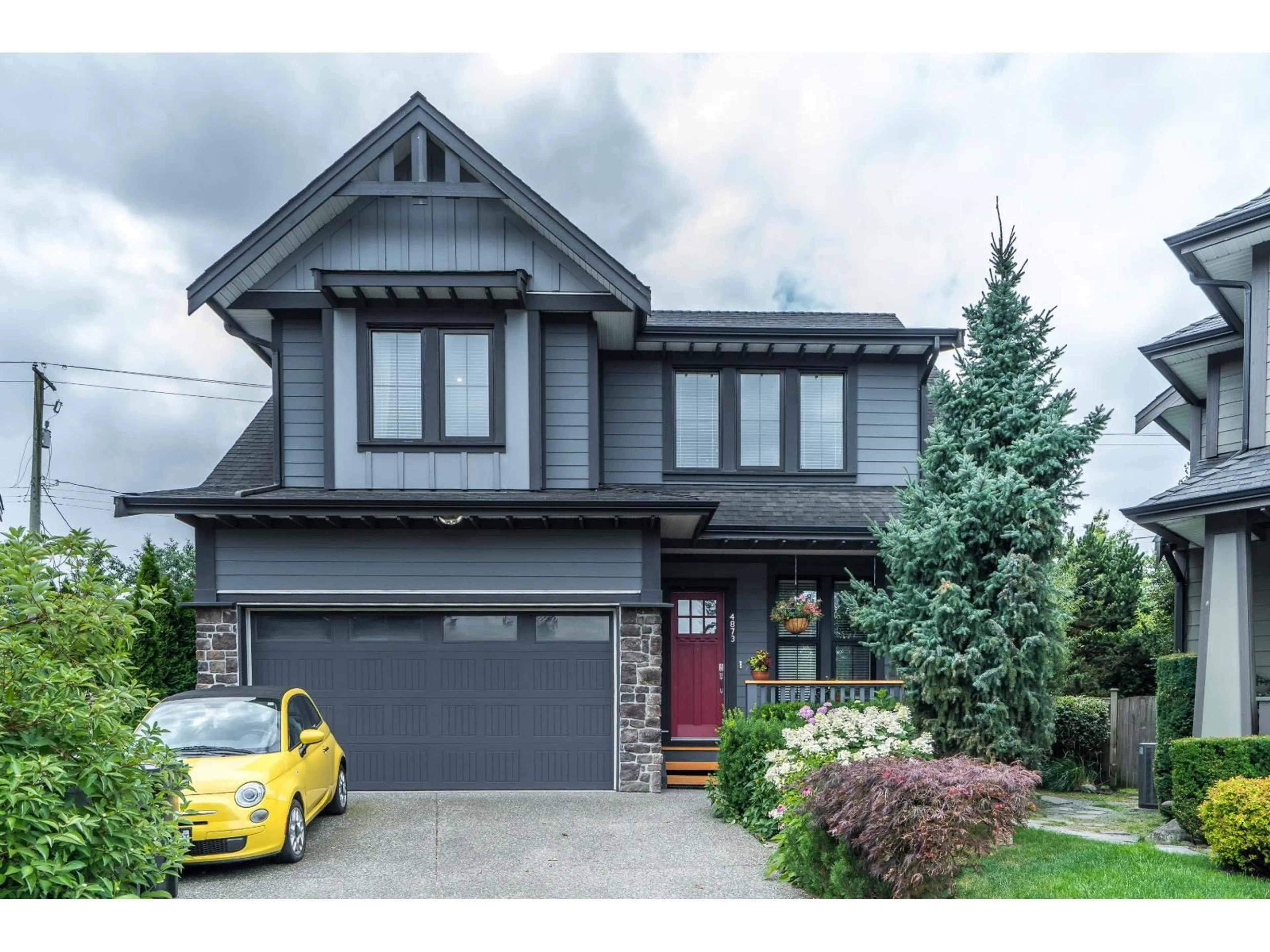 Home with vinyl exterior material, street for 4873 223B STREET, Langley British Columbia V2Y2X6