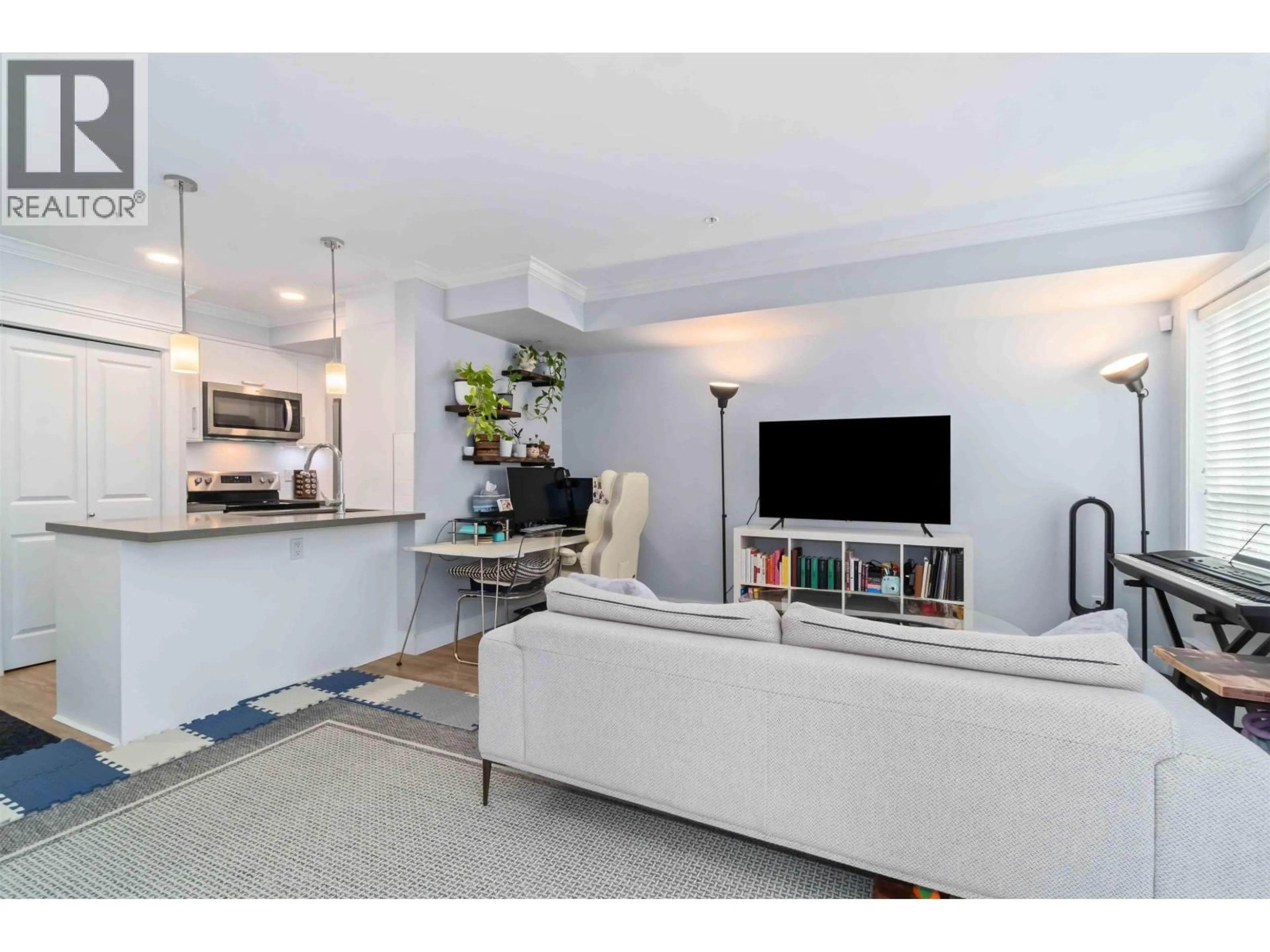 Living room with furniture, unknown for 104 - 2229 ATKINS AVENUE, Port Coquitlam British Columbia V3C1Y5