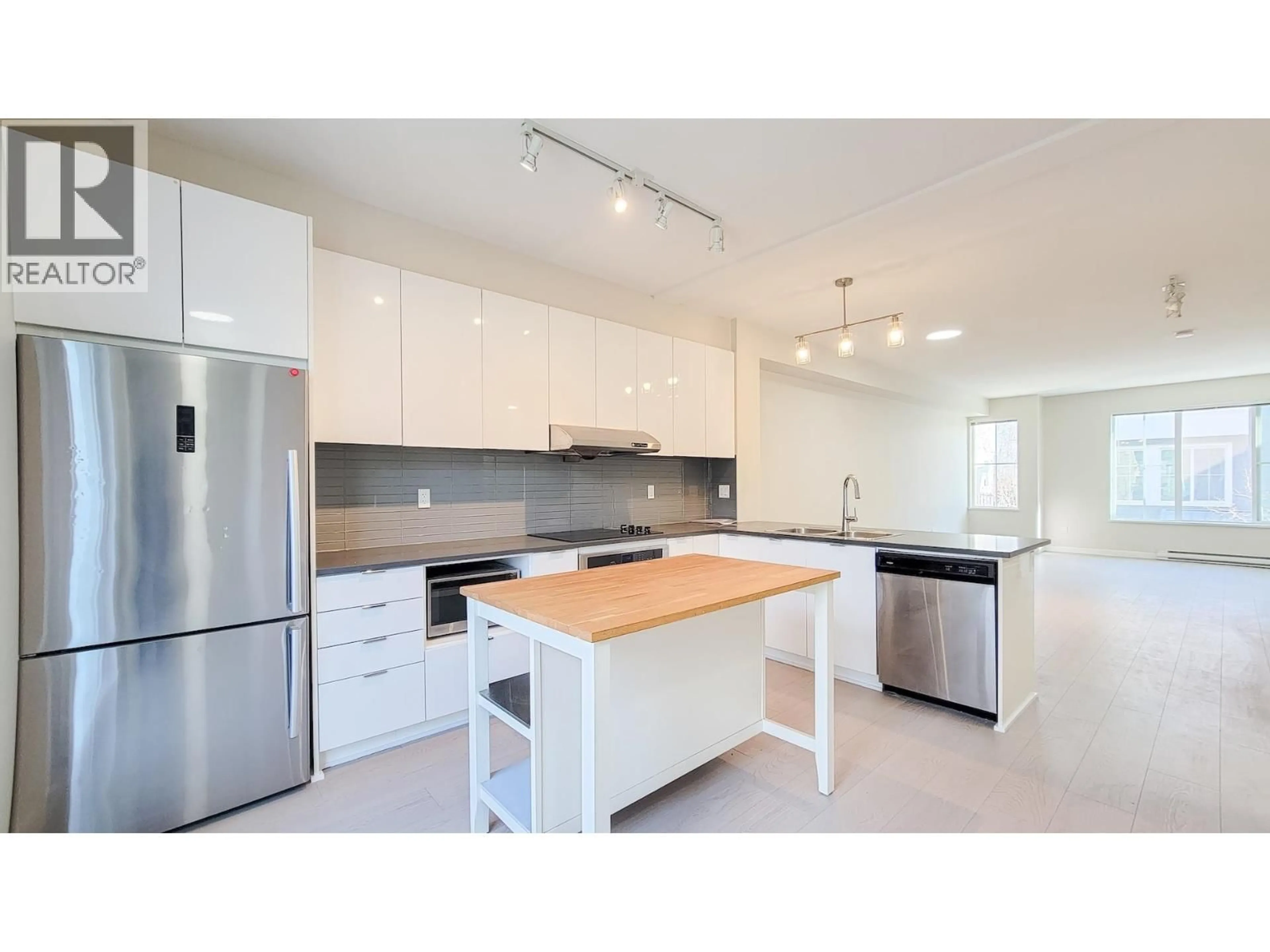 Open concept kitchen, unknown for 100 - 5550 ADMIRAL WAY, Delta British Columbia V4K0C4