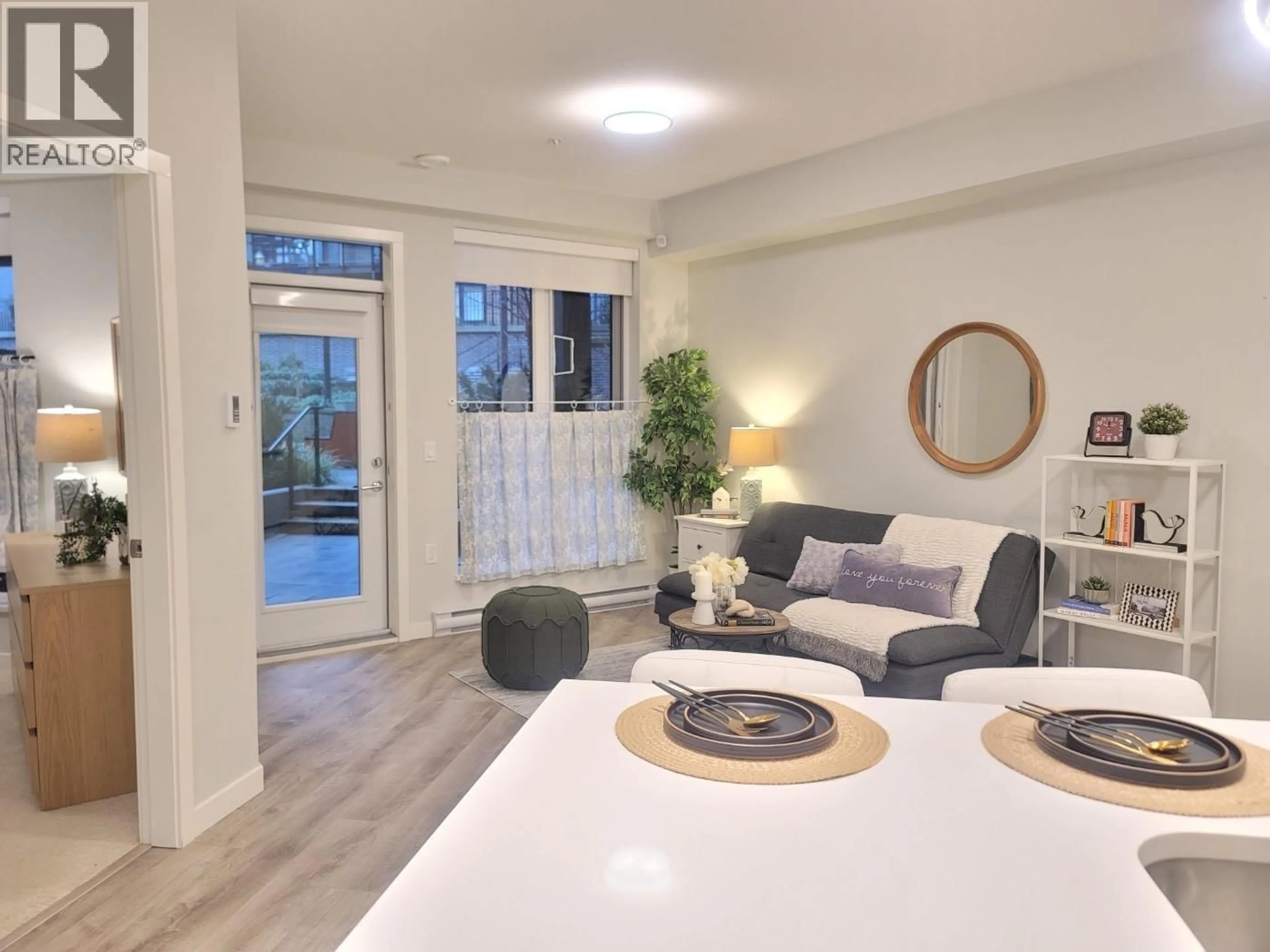 Living room with furniture, unknown for 111 - 615 COTTONWOOD AVENUE, Coquitlam British Columbia V3J0N4