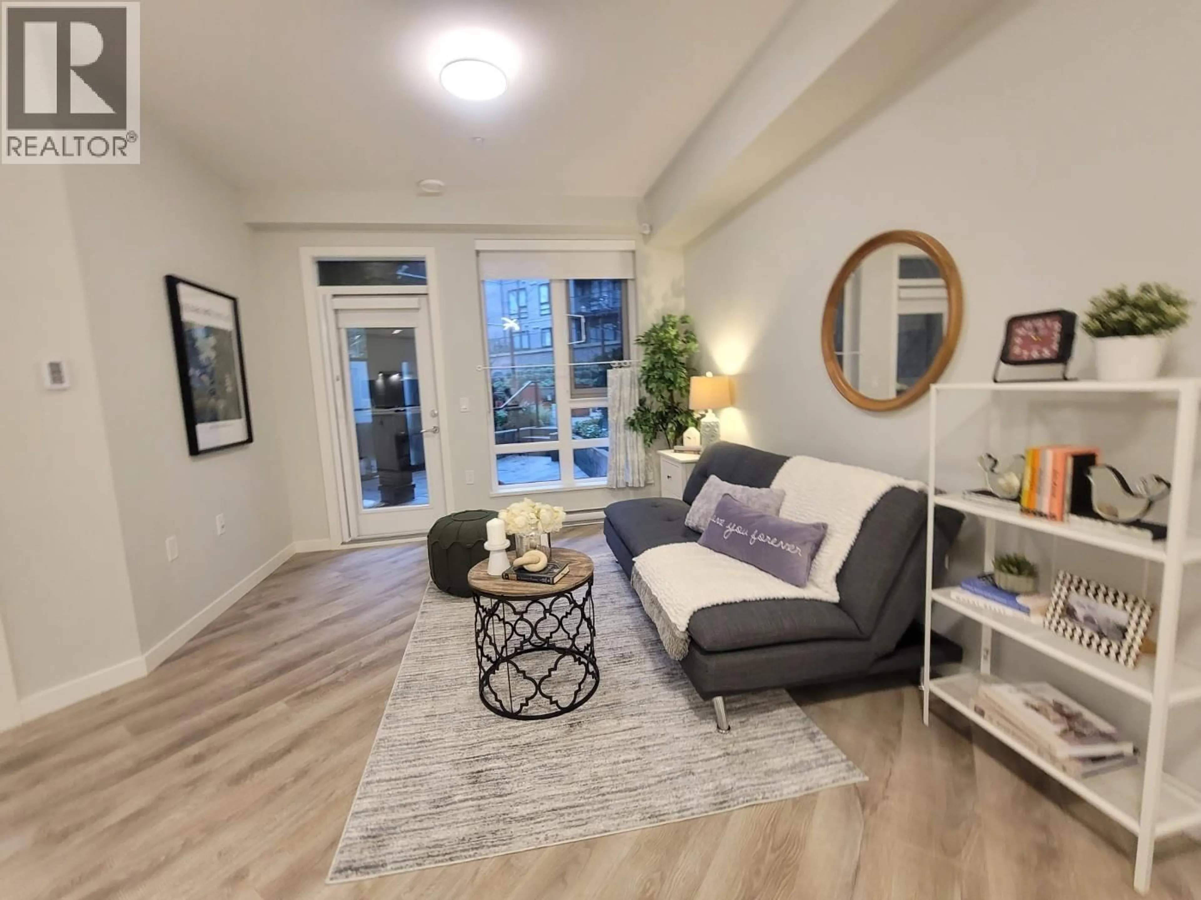 Living room with furniture, unknown for 111 - 615 COTTONWOOD AVENUE, Coquitlam British Columbia V3J0N4