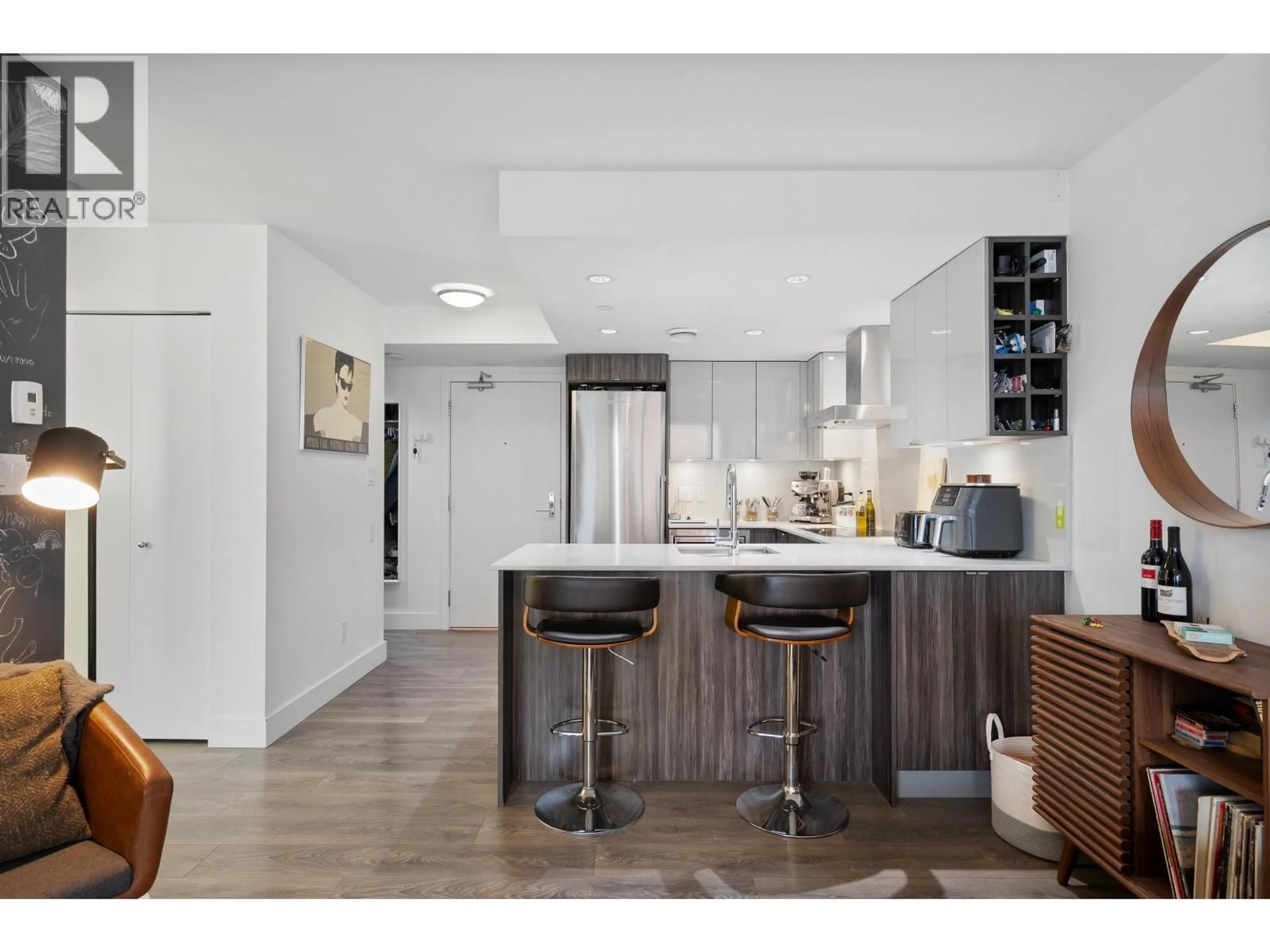 Open concept kitchen, wood/laminate floor for 1609 - 1788 COLUMBIA STREET, Vancouver British Columbia V5Y0L7