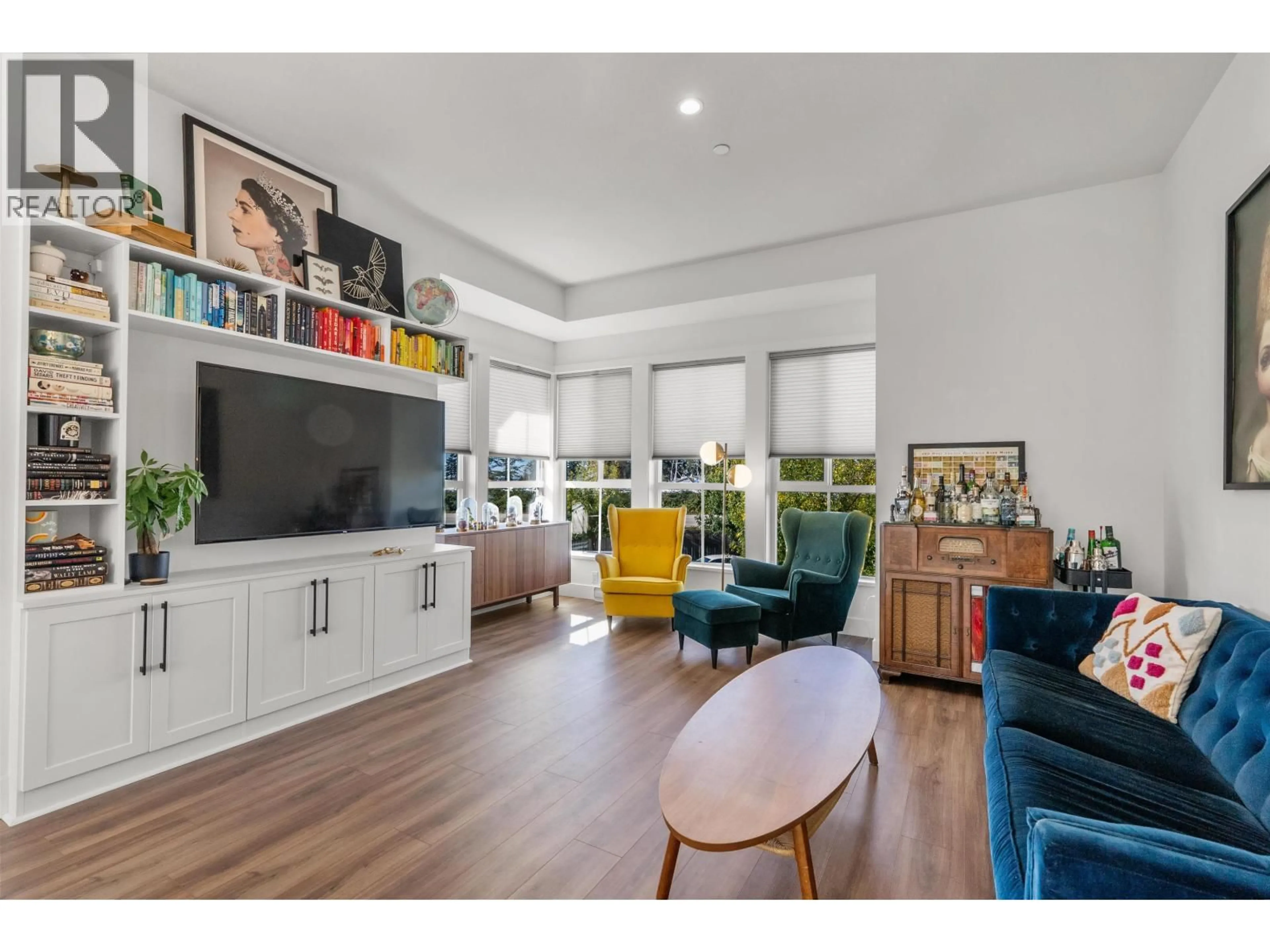 Living room with furniture, wood/laminate floor for 4656 ORCA WAY, Delta British Columbia V4M0C9