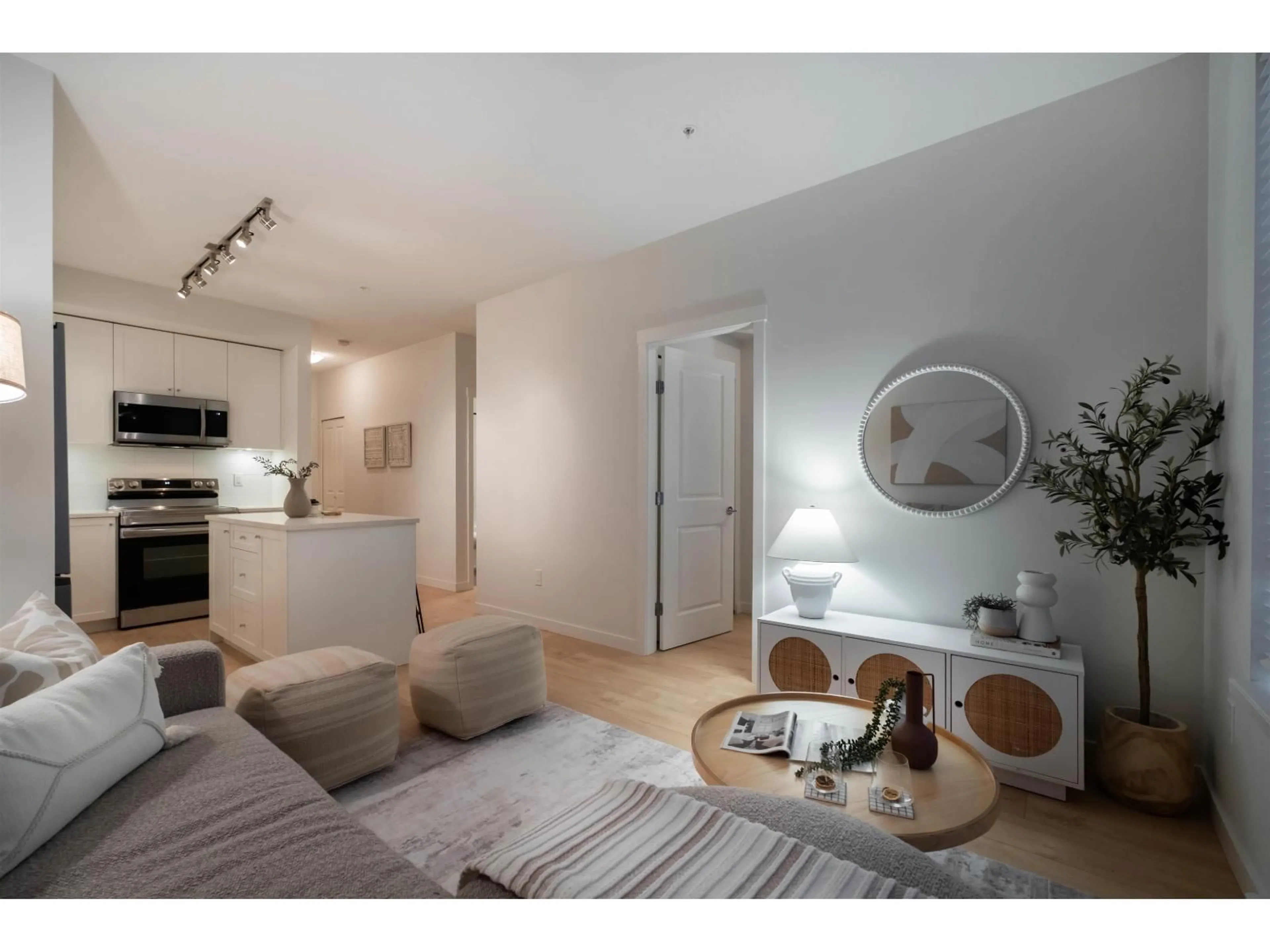 Living room with furniture, wood/laminate floor for 113 - 15858 FRASER HIGHWAY, Surrey British Columbia V4N6X4