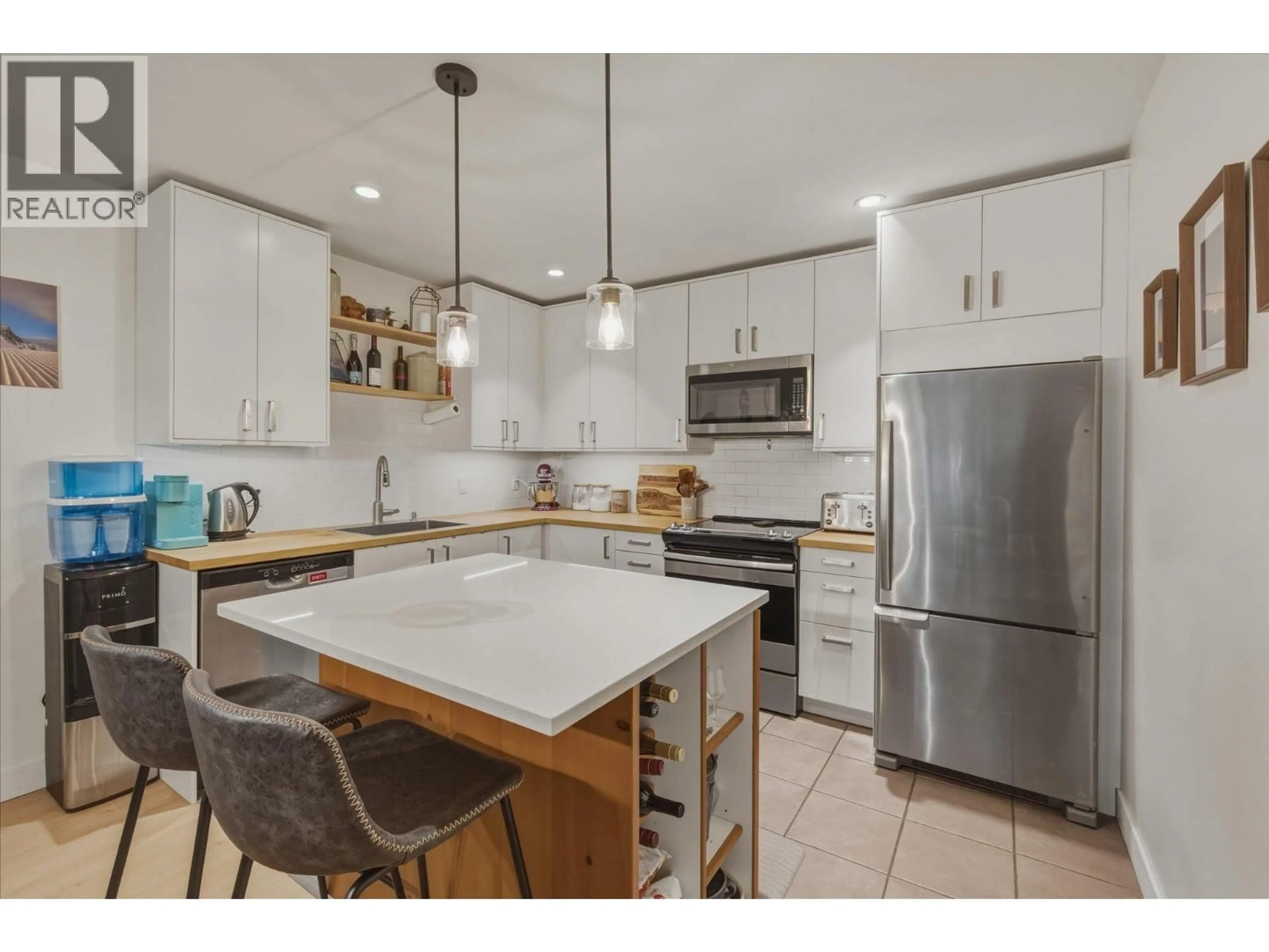 Open concept kitchen, ceramic/tile floor for 201 - 3300 PTARMIGAN PLACE, Whistler British Columbia V8E0V5