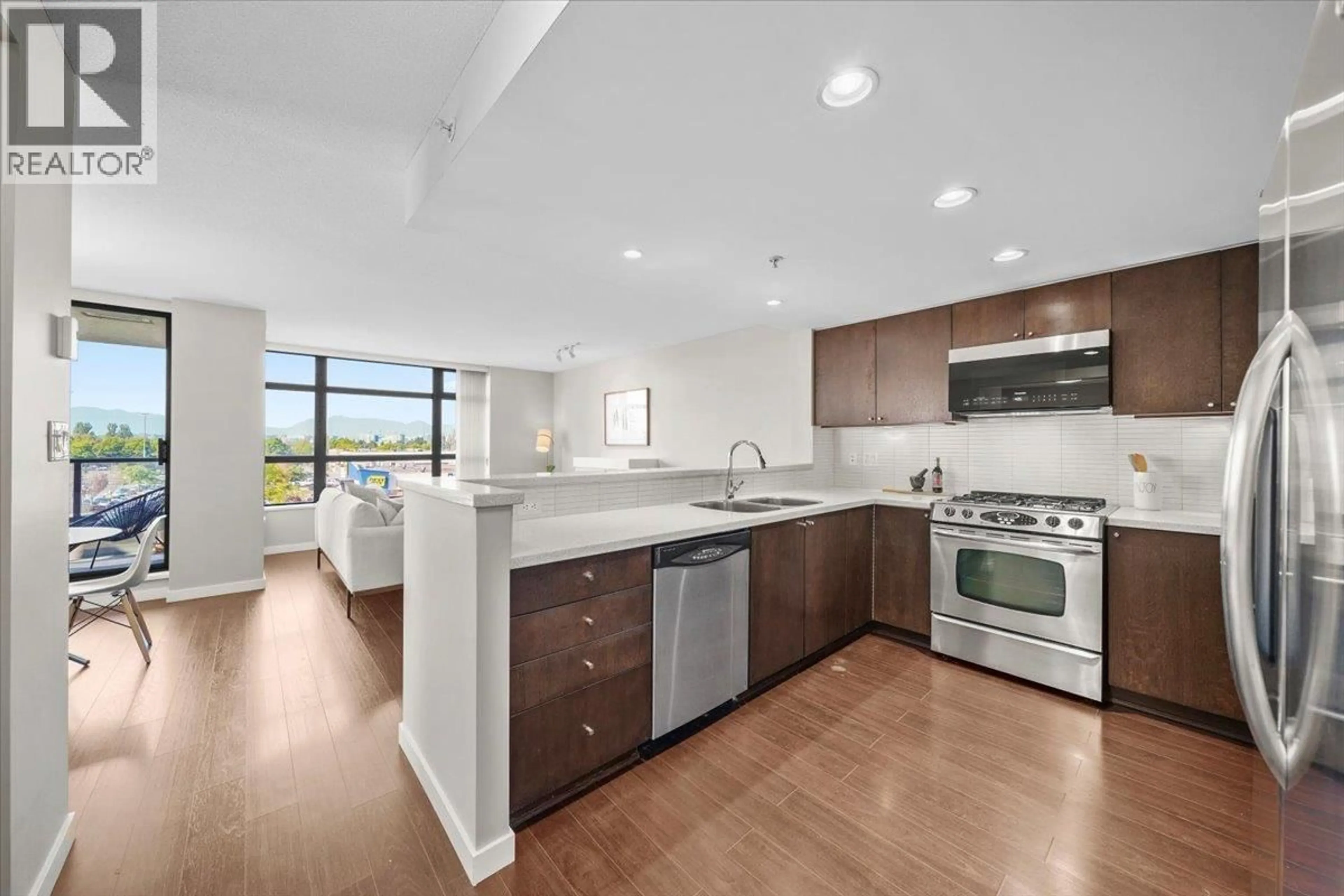 Open concept kitchen, ceramic/tile floor for 602 - 8120 LANSDOWNE ROAD, Richmond British Columbia V6X0A1