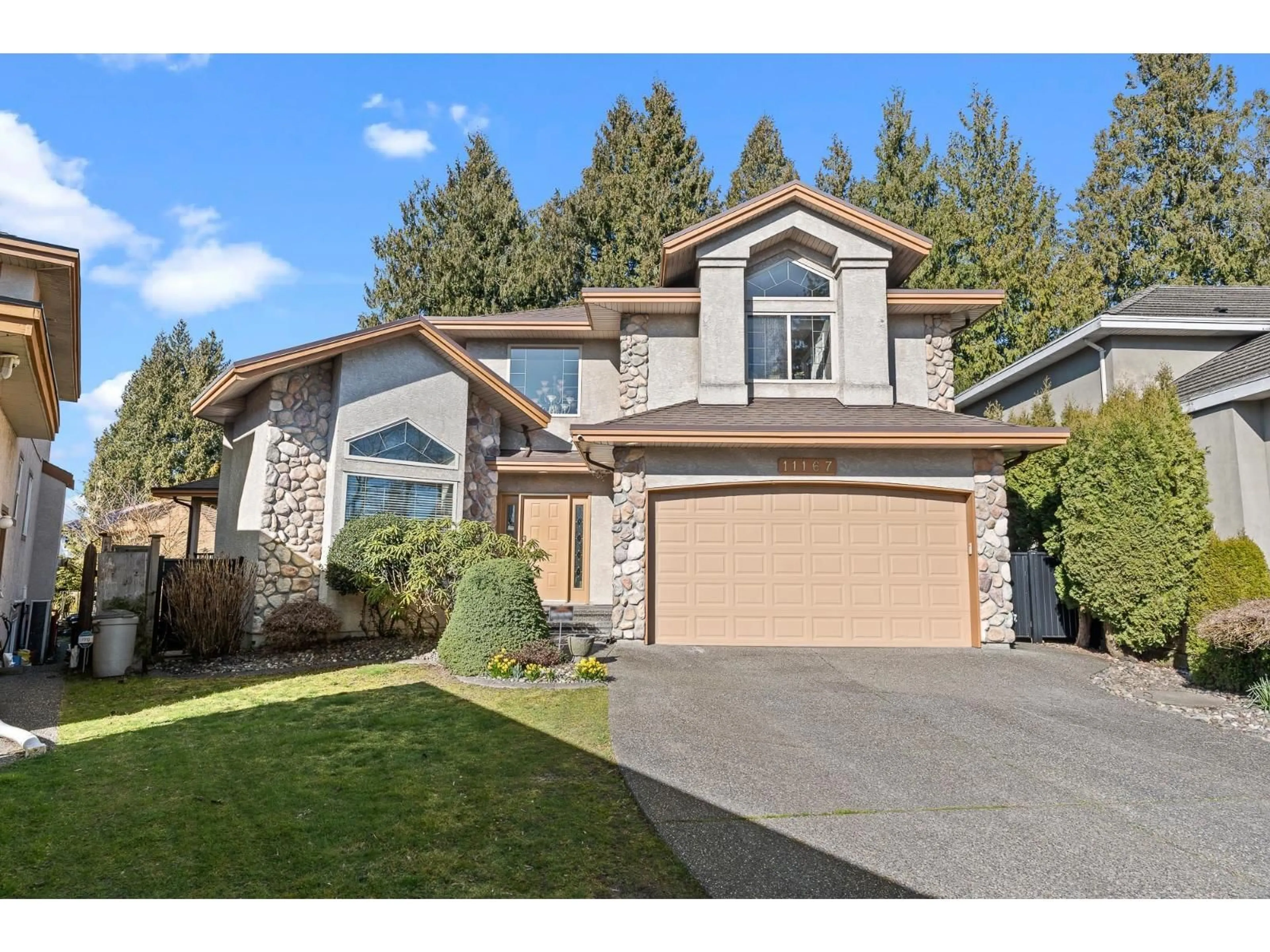 Home with vinyl exterior material, street for 11167 160A STREET, Surrey British Columbia V4N4Z2