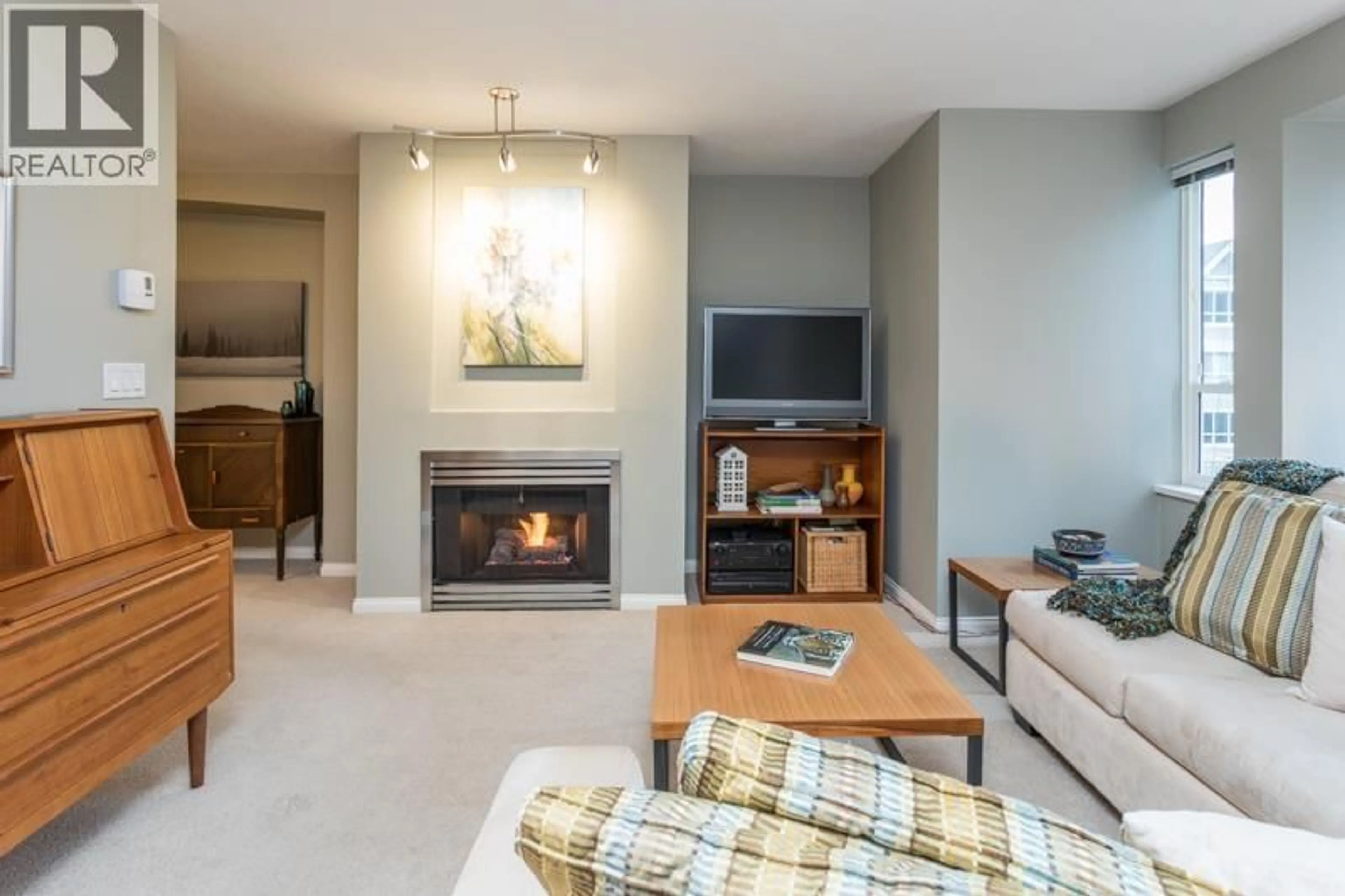 Living room with furniture, unknown for 113 - 3099 TERRAVISTA PLACE, Port Moody British Columbia V3H5A4