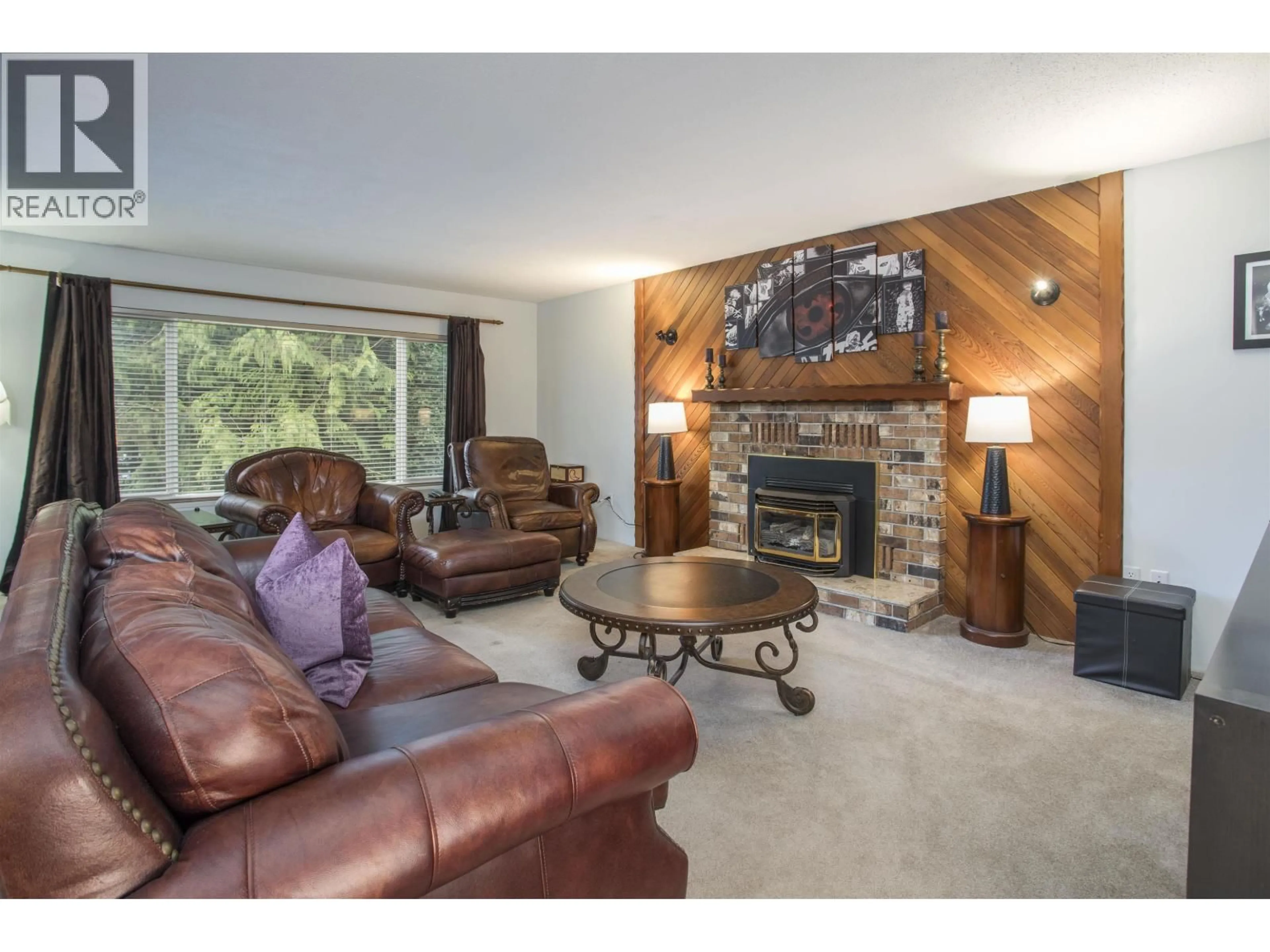 Living room with furniture, wood/laminate floor for 12152 261 STREET, Maple Ridge British Columbia V2W2A6