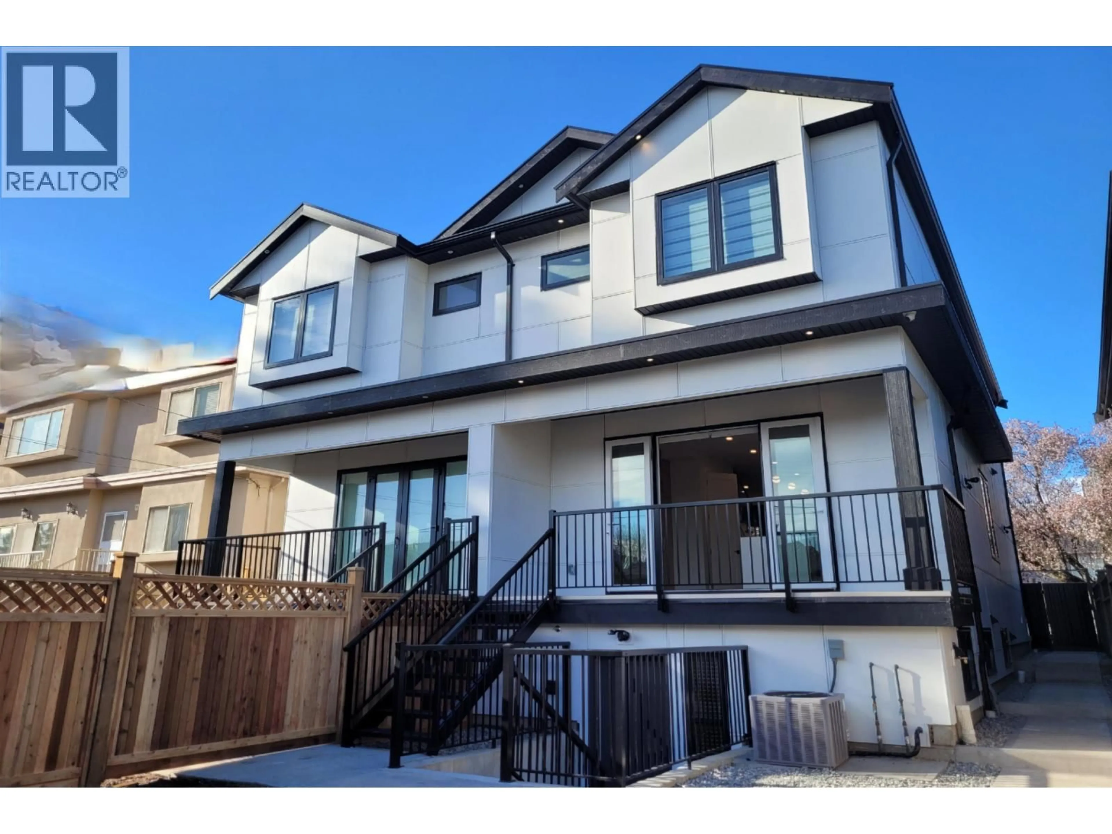 Home with vinyl exterior material, street for 1 - 560 63RD AVENUE, Vancouver British Columbia V6P2G8