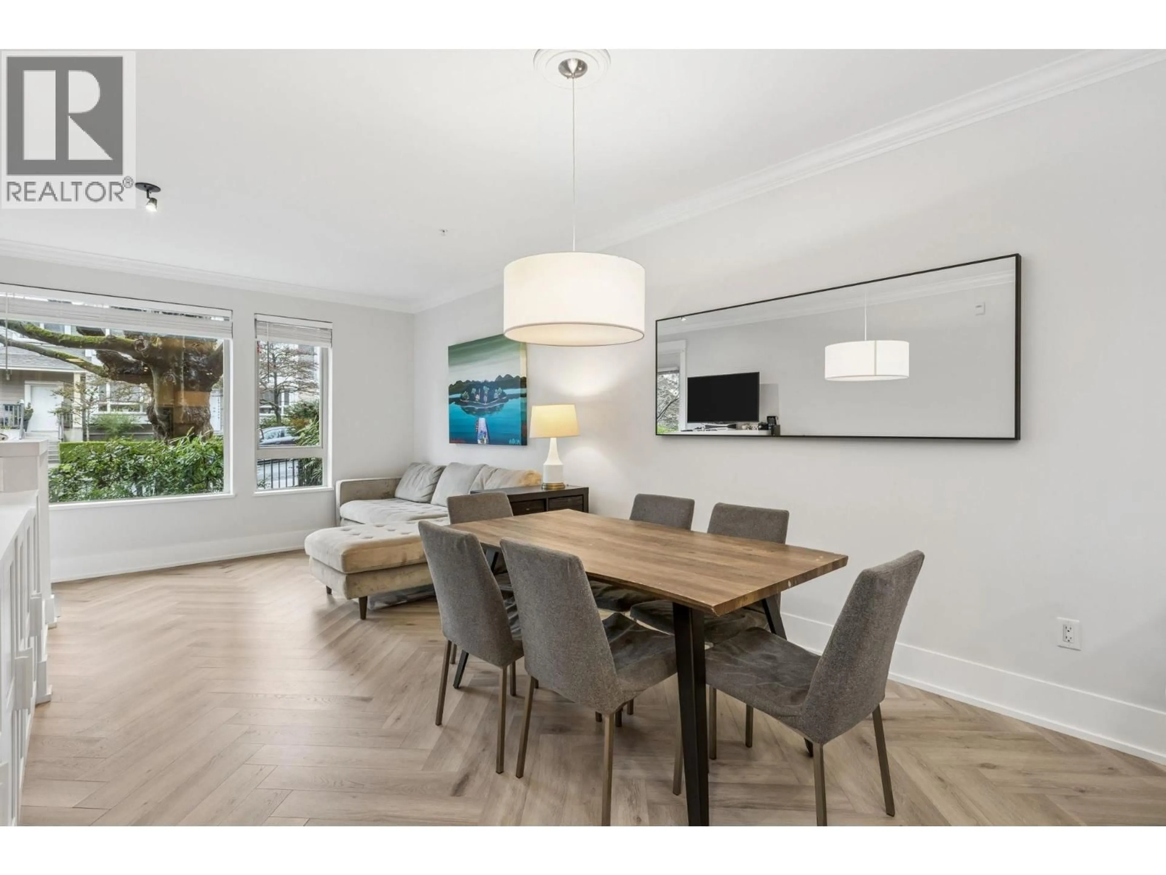 Dining room, wood/laminate floor for 107 - 159 22ND STREET, North Vancouver British Columbia V7M0B6