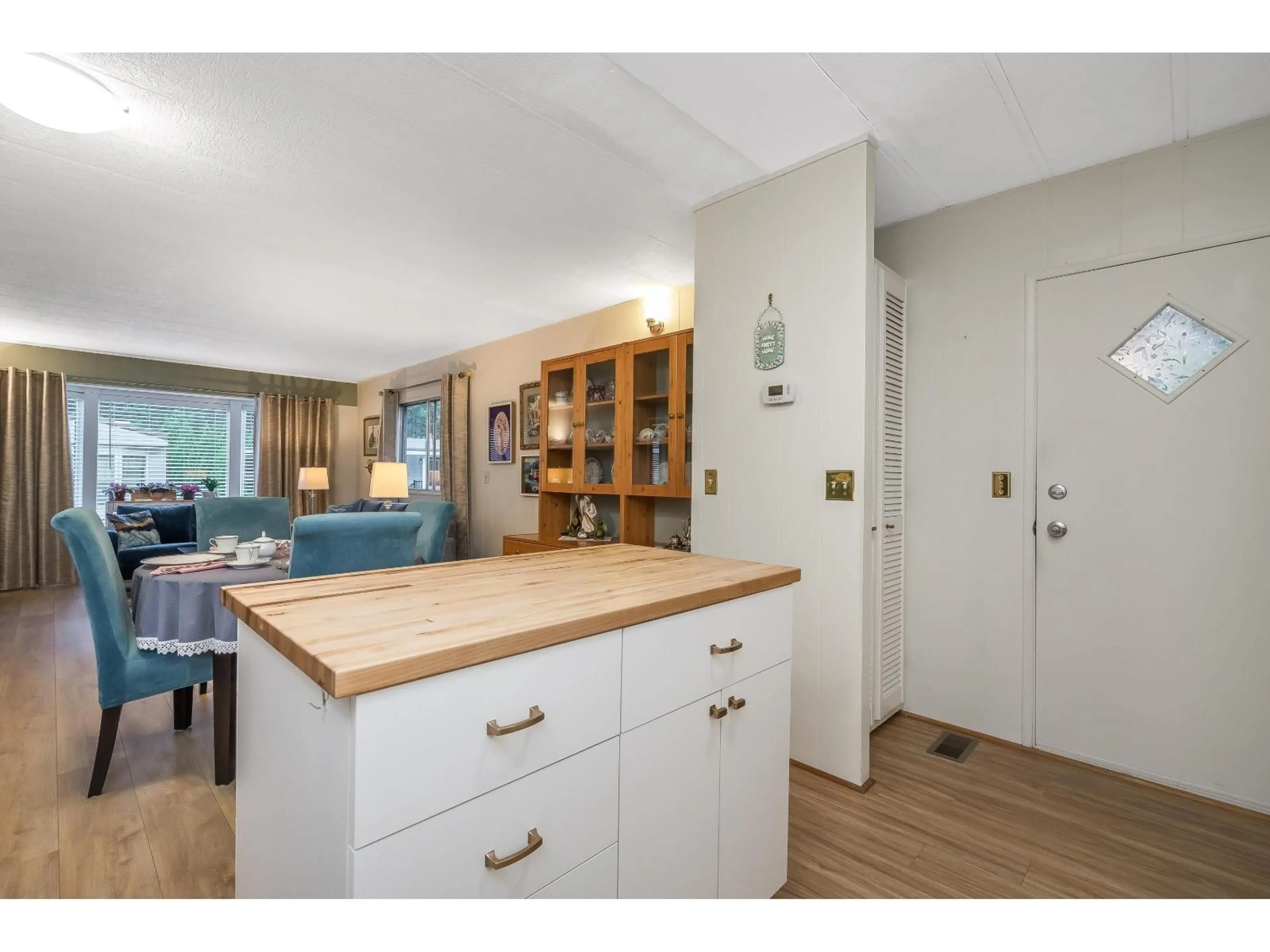 Open concept kitchen, wood/laminate floor for #46 - 2305 200TH STREET, Langley British Columbia V2Z1Z2