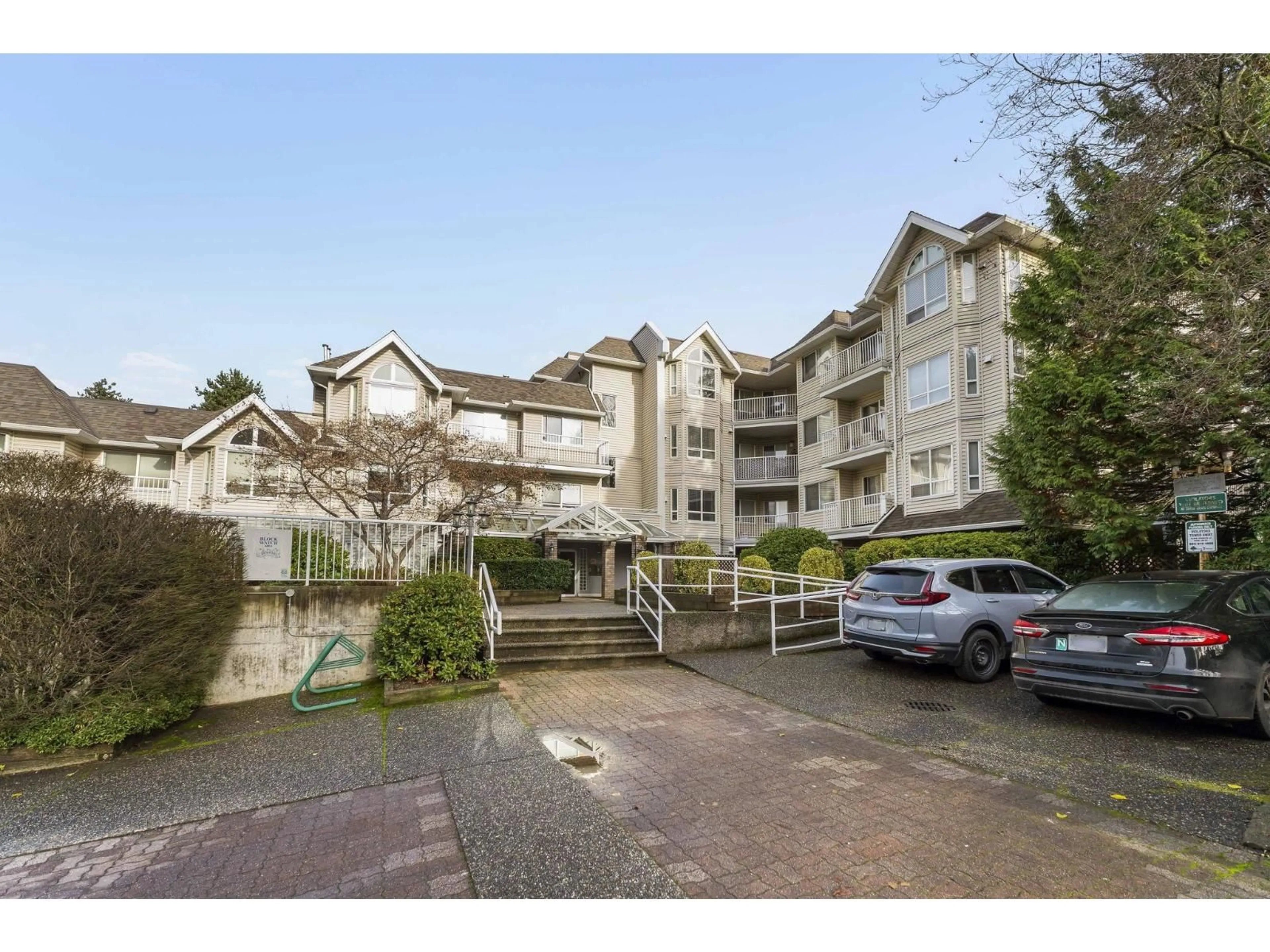 A pic from outside/outdoor area/front of a property/back of a property/a pic from drone, mountain view for 208 - 13475 96 AVENUE, Surrey British Columbia V3V1Y8