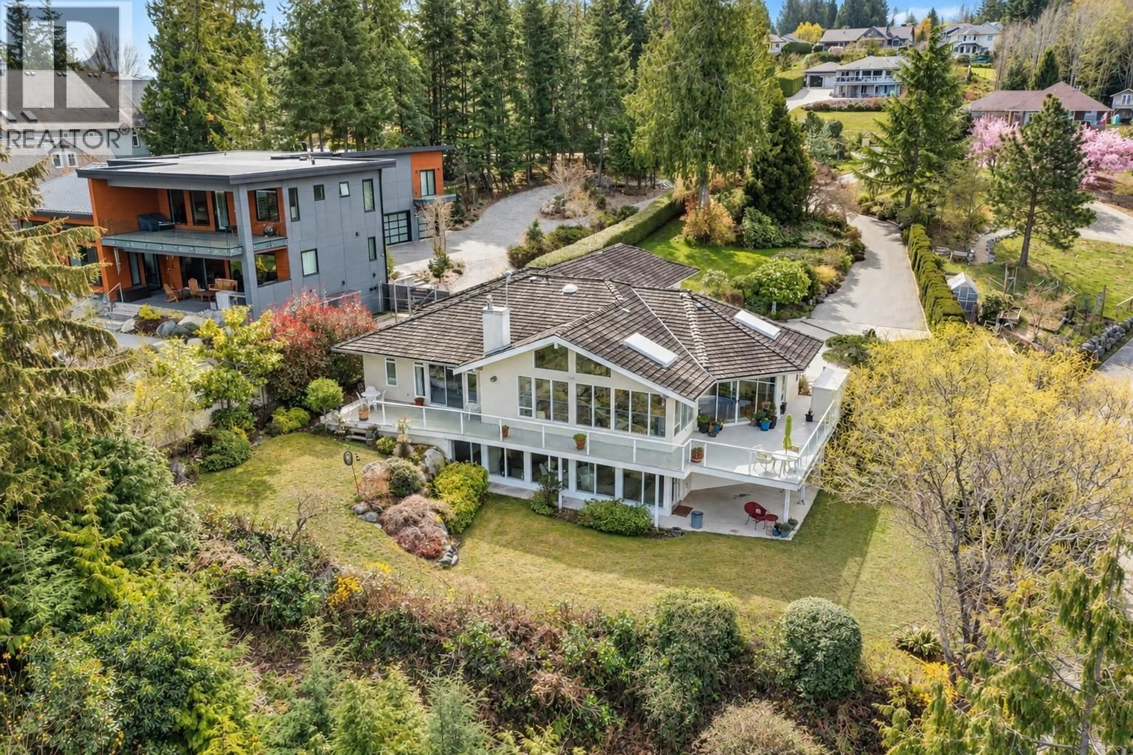 A pic from outside/outdoor area/front of a property/back of a property/a pic from drone, mountain view for 6484 GALE AVENUE, Sechelt British Columbia V7Z0L1