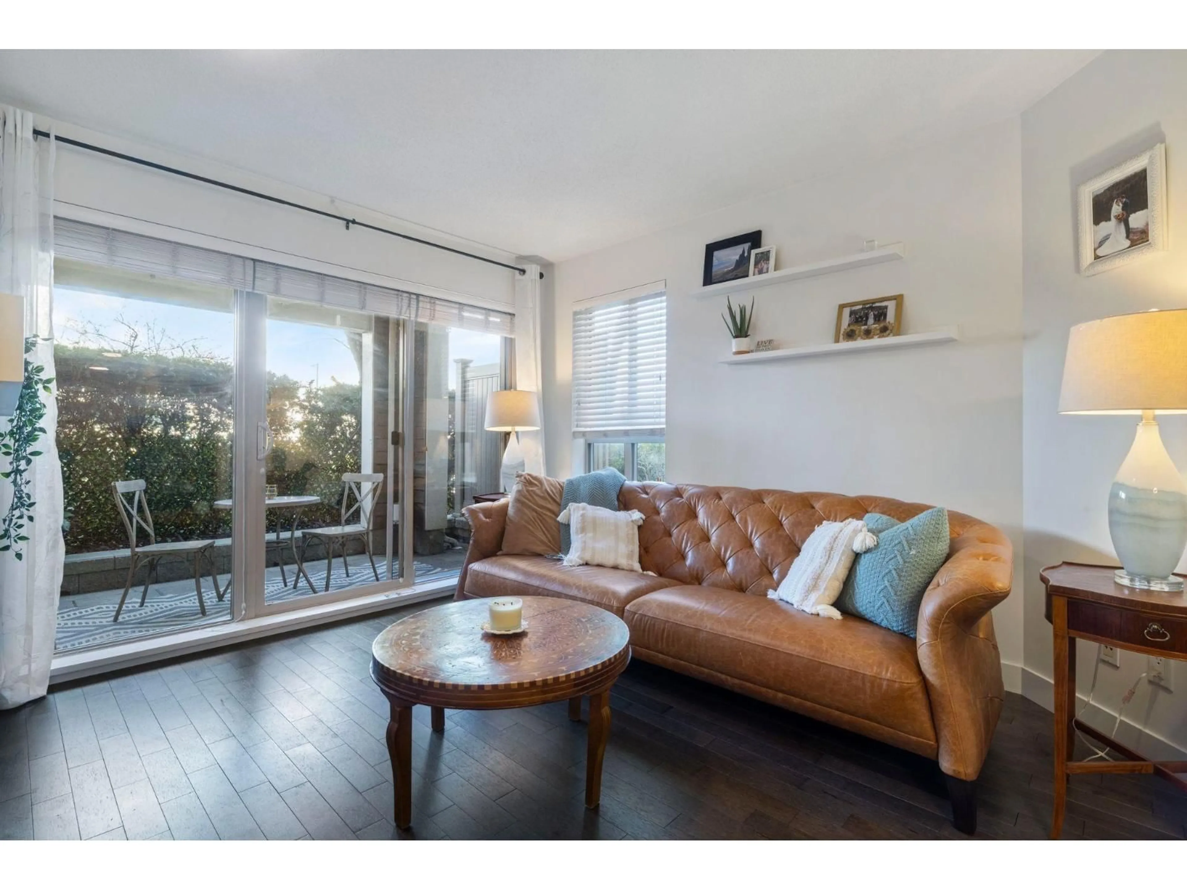 Living room with furniture, wood/laminate floor for 105 - 8915 202 STREET, Langley British Columbia V1M0B5