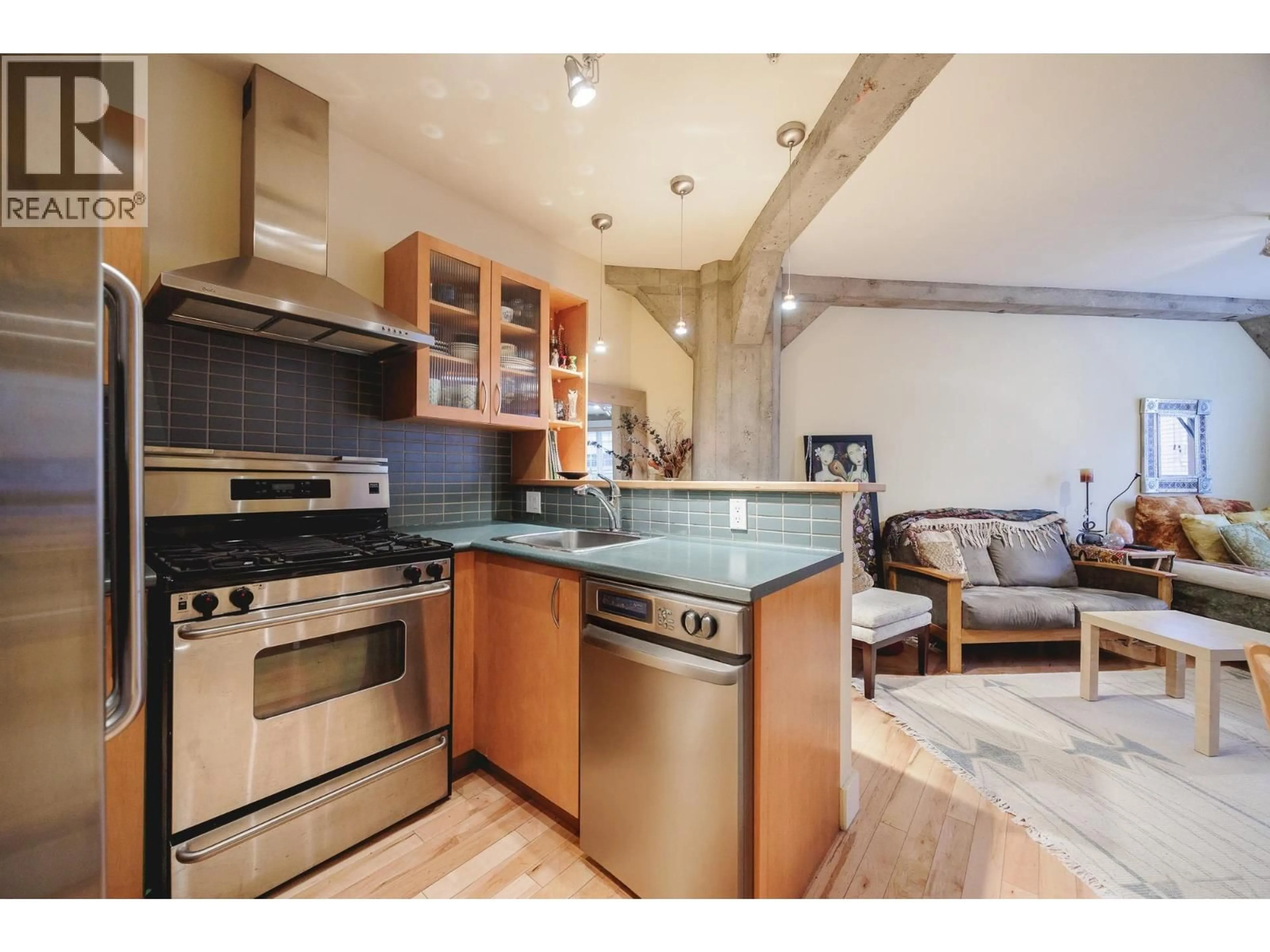 Open concept kitchen, ceramic/tile floor for 210 - 1216 HOMER STREET, Vancouver British Columbia V6B6K5