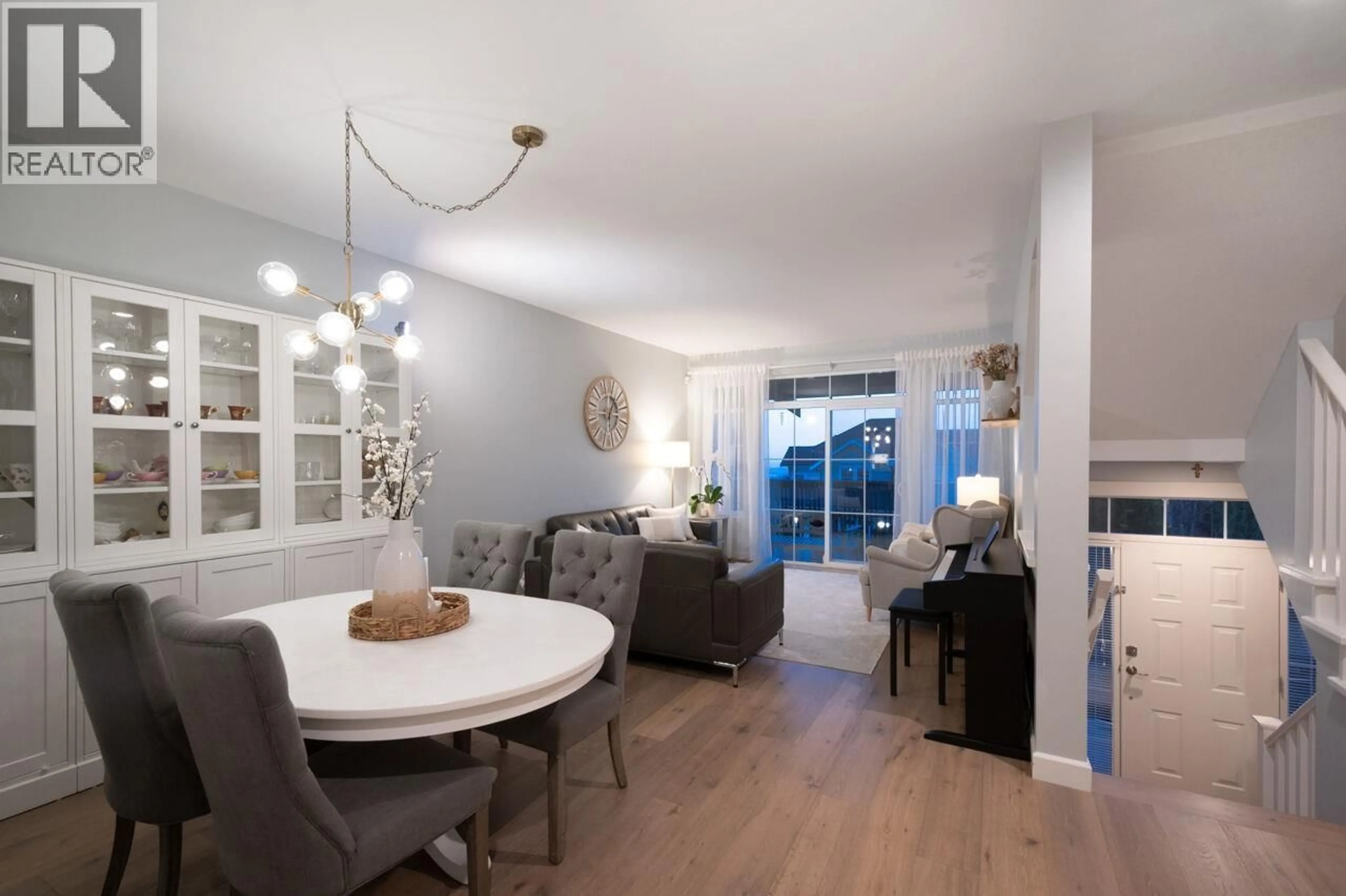 Living room with furniture, wood/laminate floor for 29 HICKORY DRIVE, Port Moody British Columbia V3H5L9