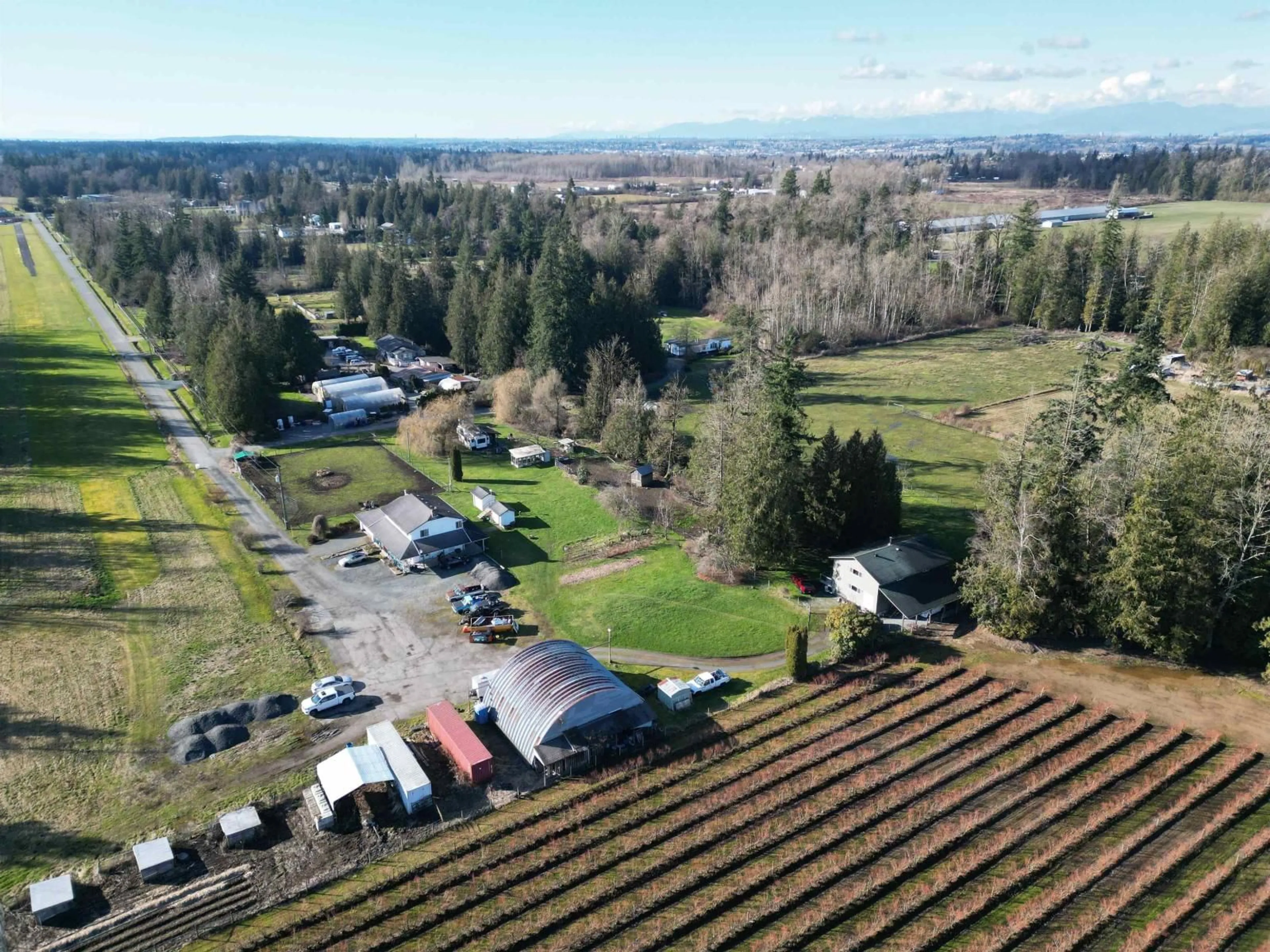 A pic from outside/outdoor area/front of a property/back of a property/a pic from drone, mountain view for 22828 38 AVENUE, Langley British Columbia V2Z2G9