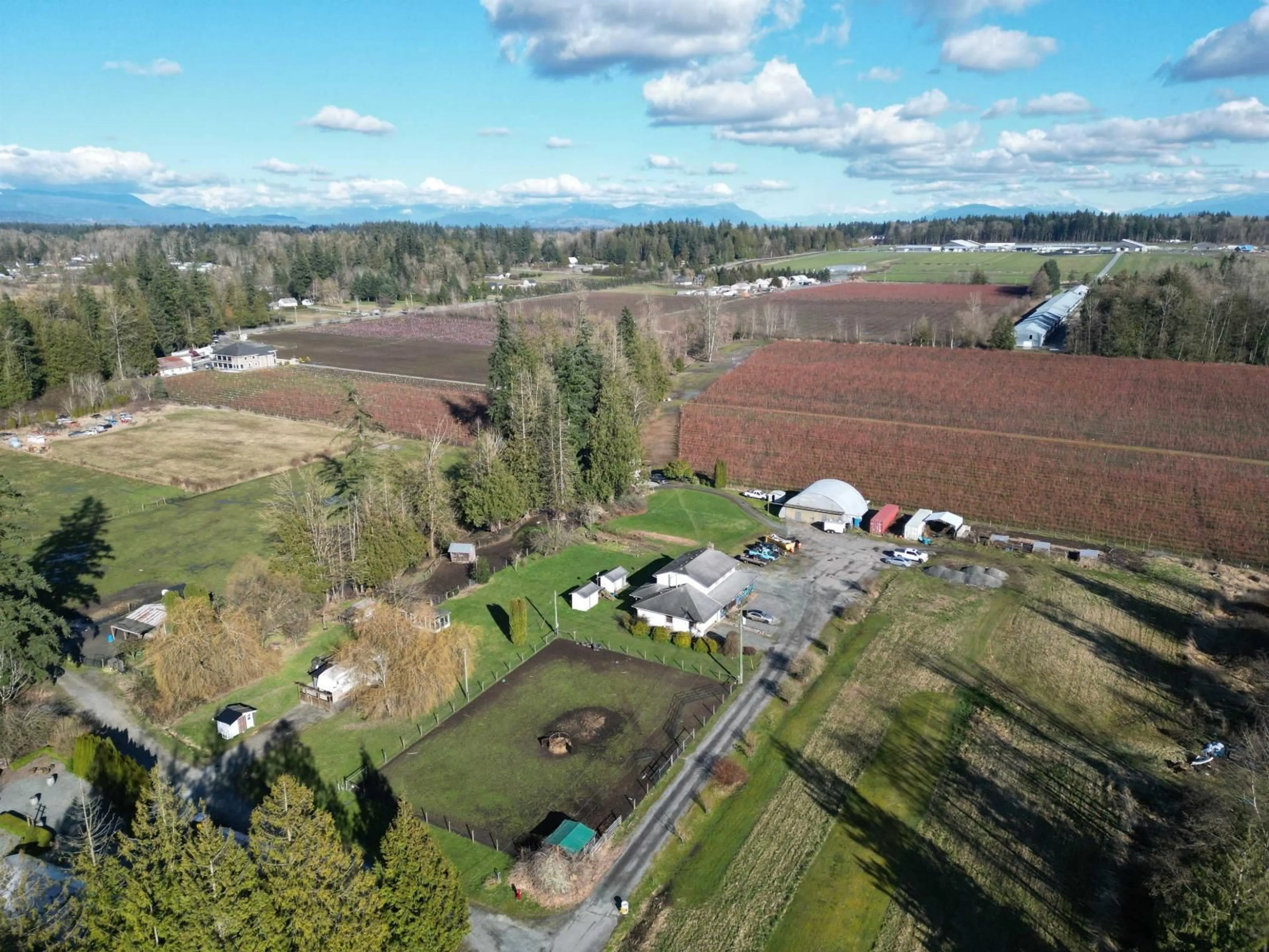 A pic from outside/outdoor area/front of a property/back of a property/a pic from drone, mountain view for 22828 38 AVENUE, Langley British Columbia V2Z2G9
