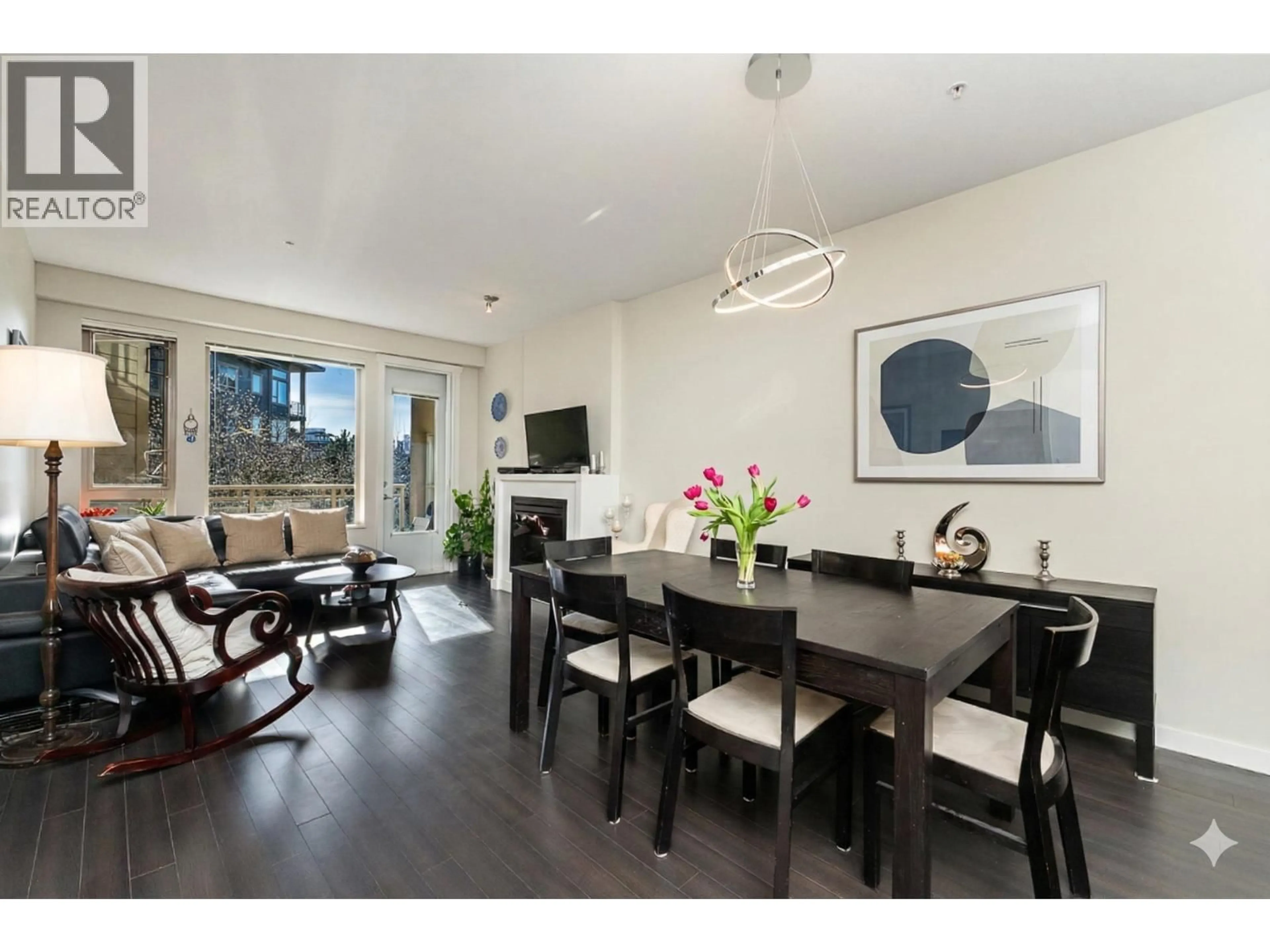 Dining room, wood/laminate floor for 311 - 159 22ND STREET, North Vancouver British Columbia V7M0B6