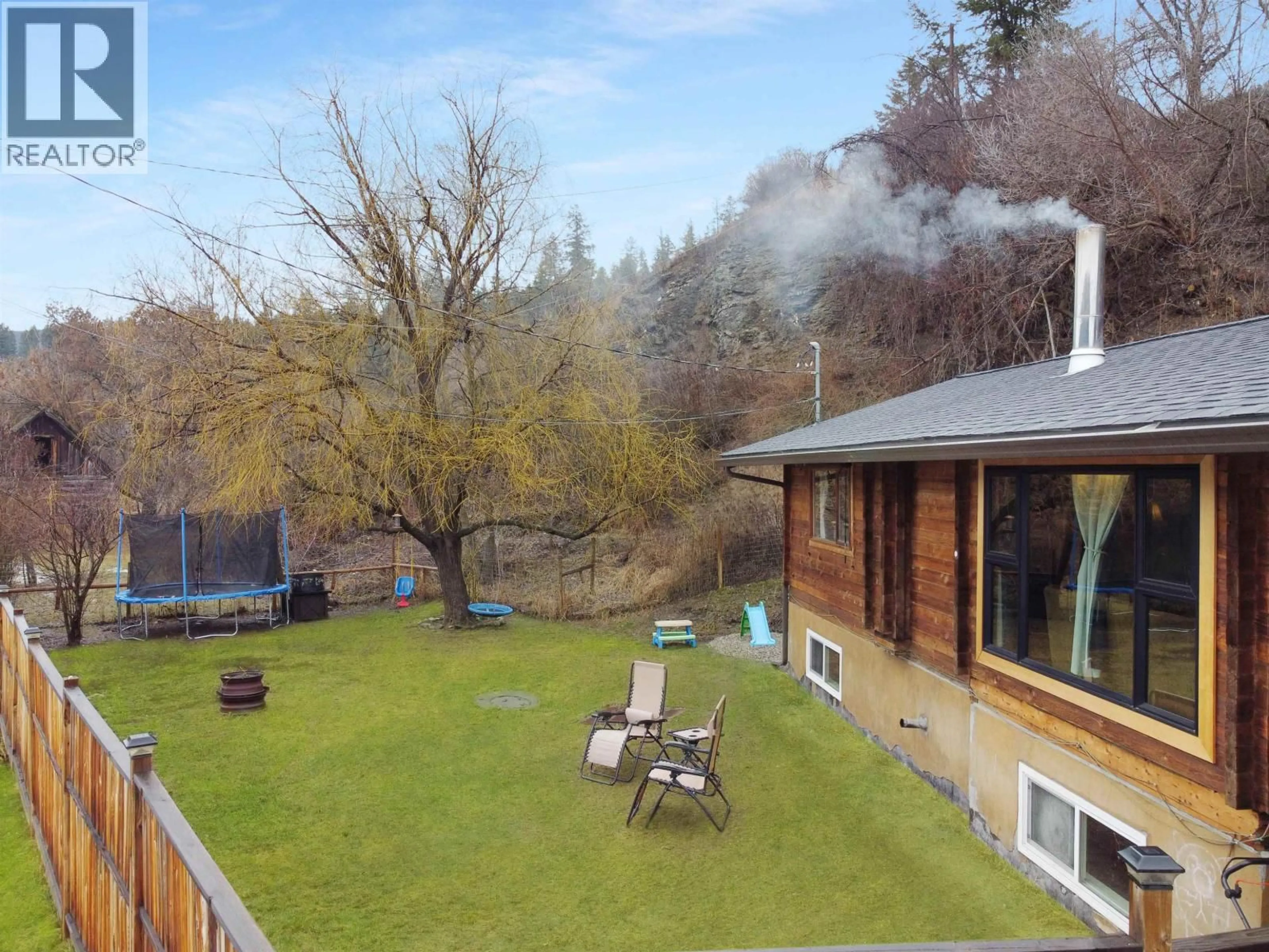 A pic from outside/outdoor area/front of a property/back of a property/a pic from drone, unknown for 1481 SODA CREEK TOWNSITE ROAD, Williams Lake British Columbia V2G5A4