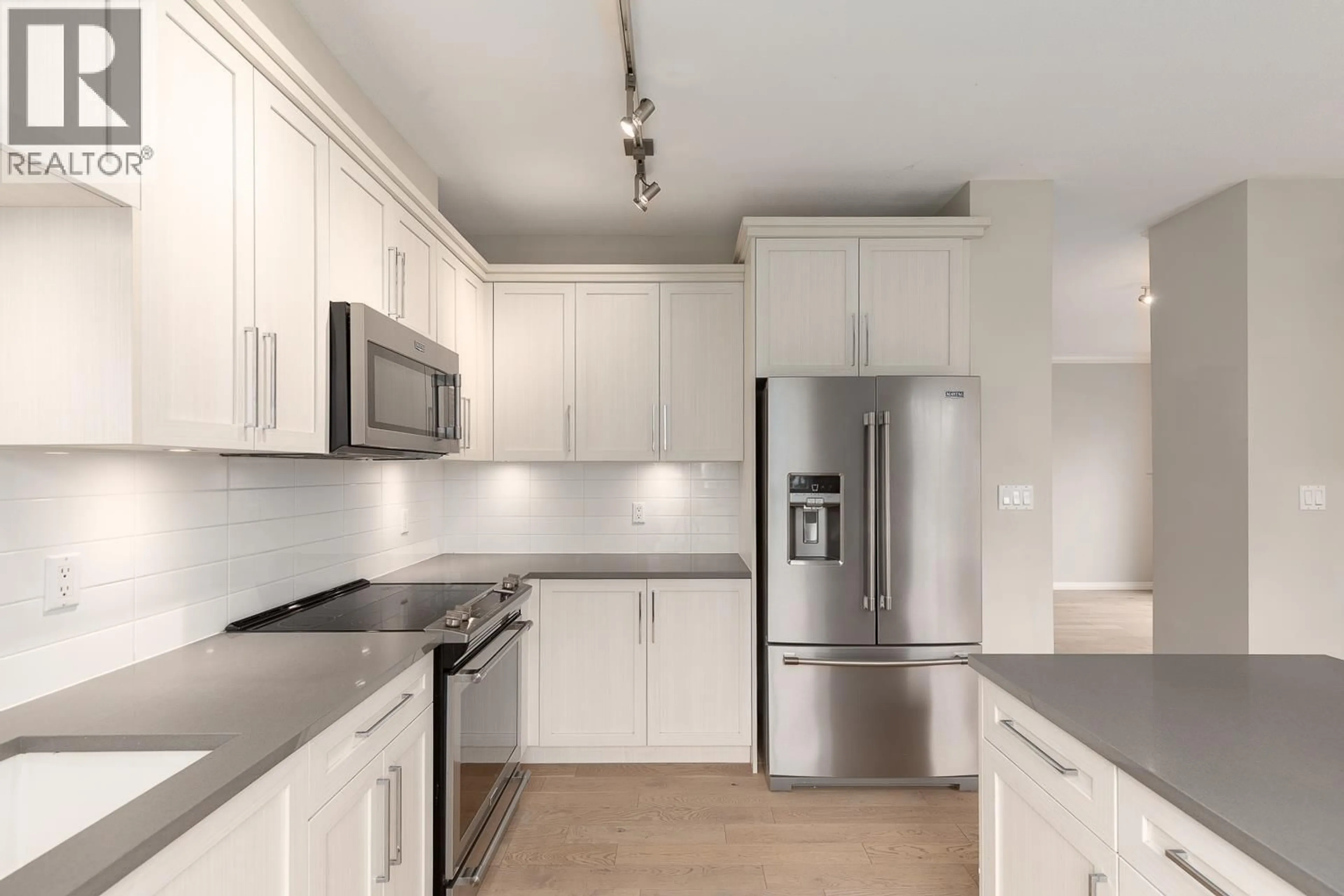 Open concept kitchen, unknown for 144 - 3098 GUILDFORD WAY, Coquitlam British Columbia V3B7W8