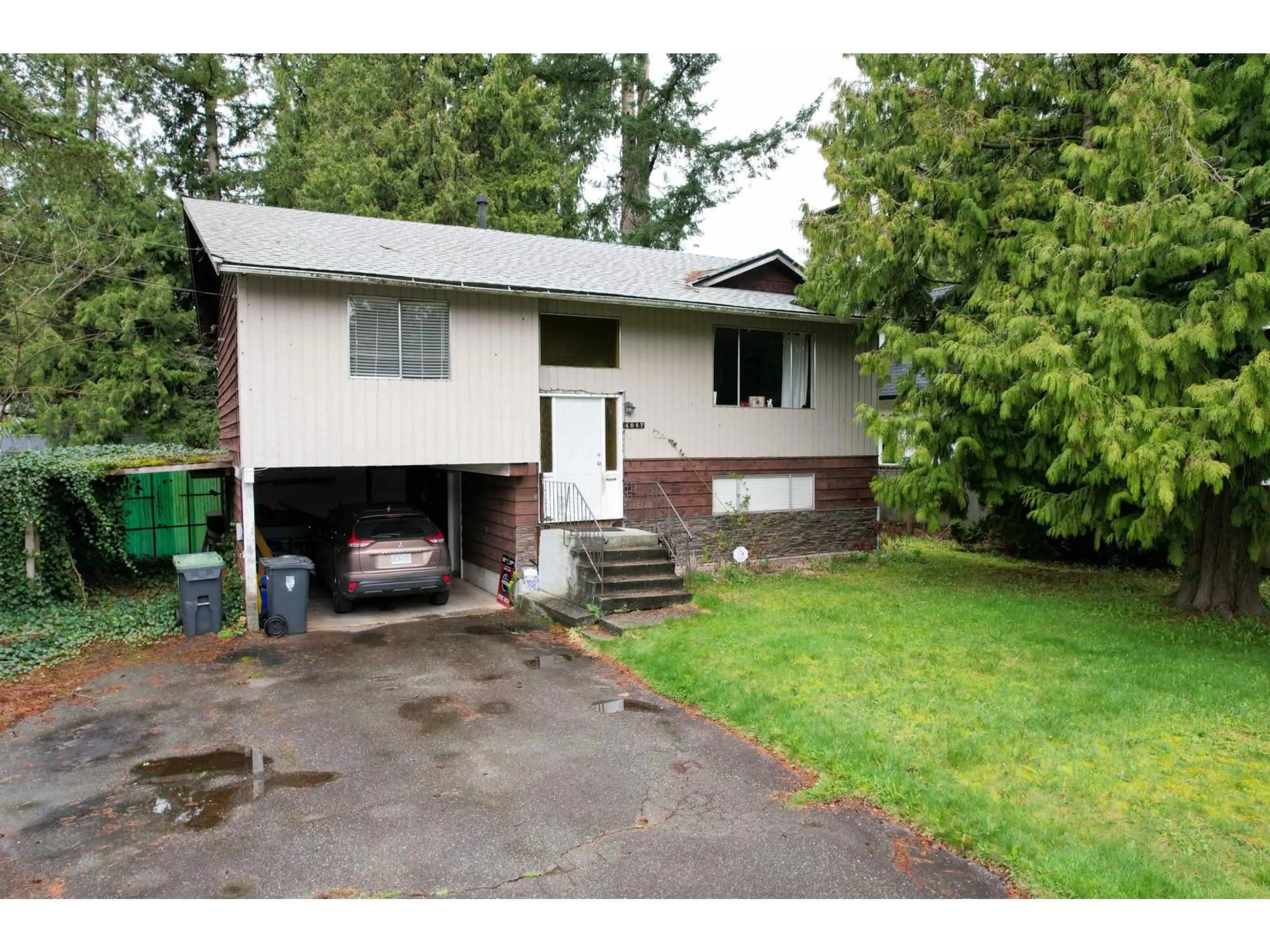 Home with vinyl exterior material, street for 4047 204B STREET, Langley British Columbia V3V1A8