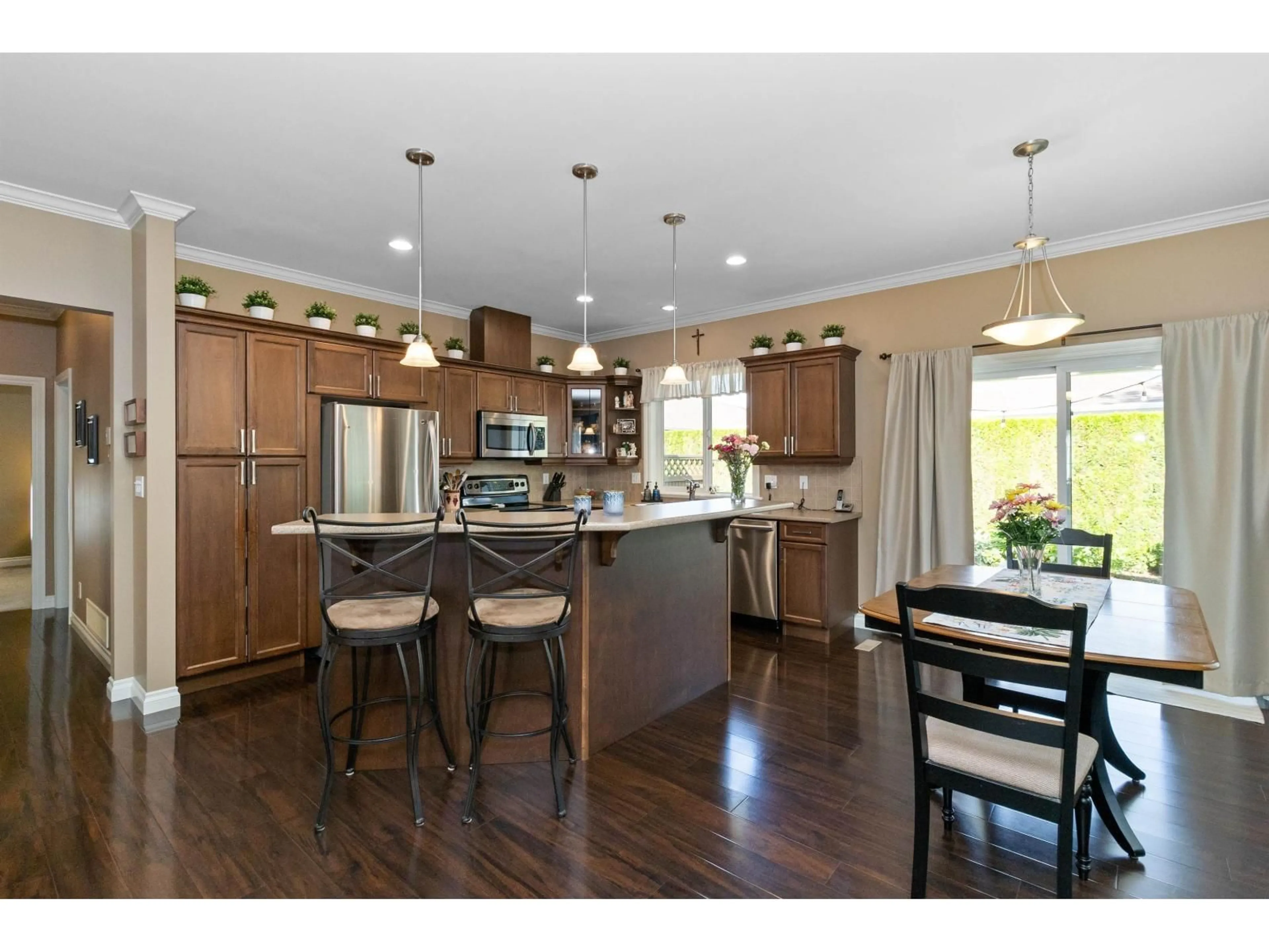 Open concept kitchen, wood/laminate floor for 64 - 7600 CHILLIWACK RIVER ROAD, Chilliwack British Columbia V2R3Z6