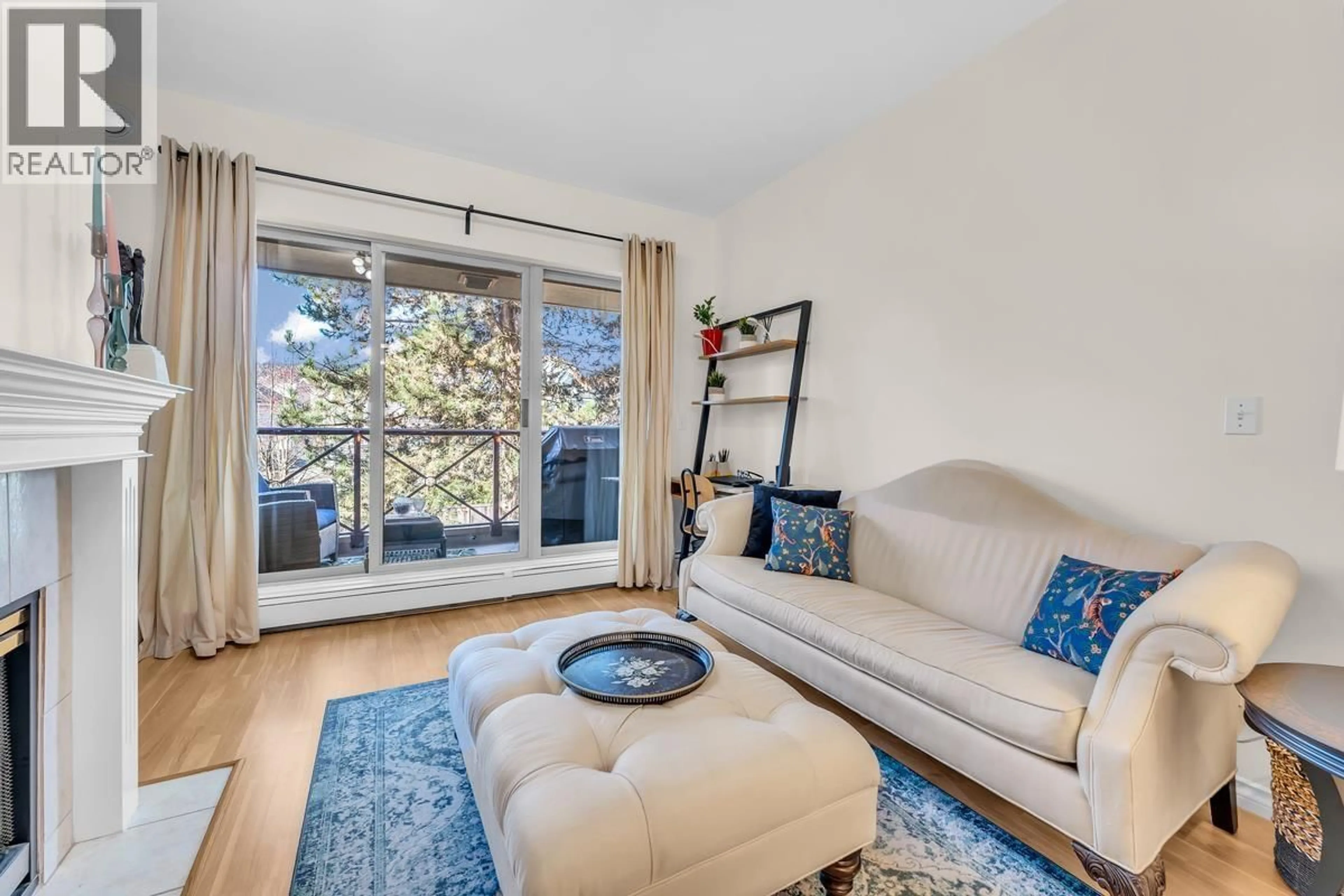 Living room with furniture, unknown for 215 - 2109 ROWLAND STREET, Port Coquitlam British Columbia V3C6J4