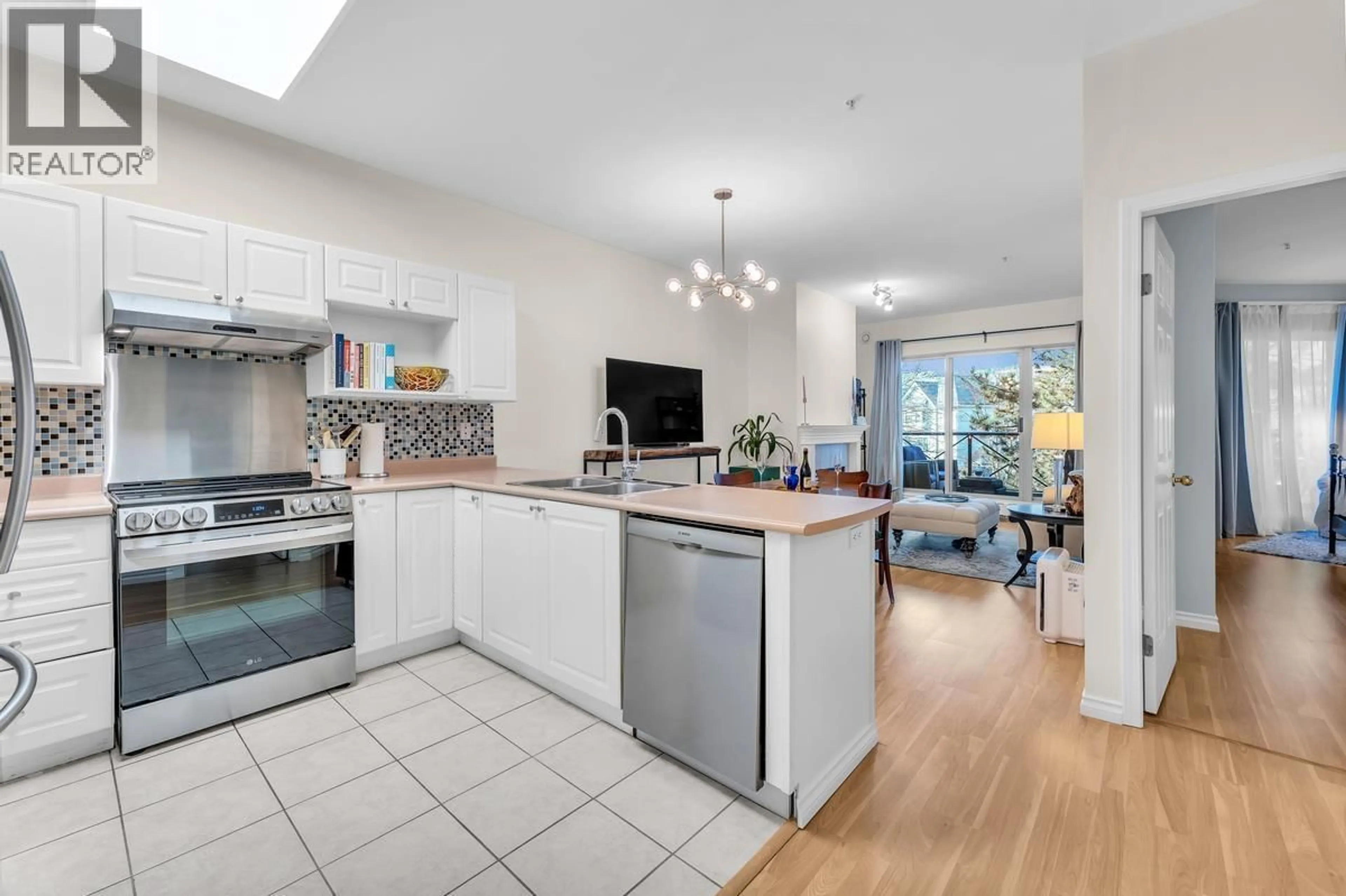 Open concept kitchen, unknown for 215 - 2109 ROWLAND STREET, Port Coquitlam British Columbia V3C6J4