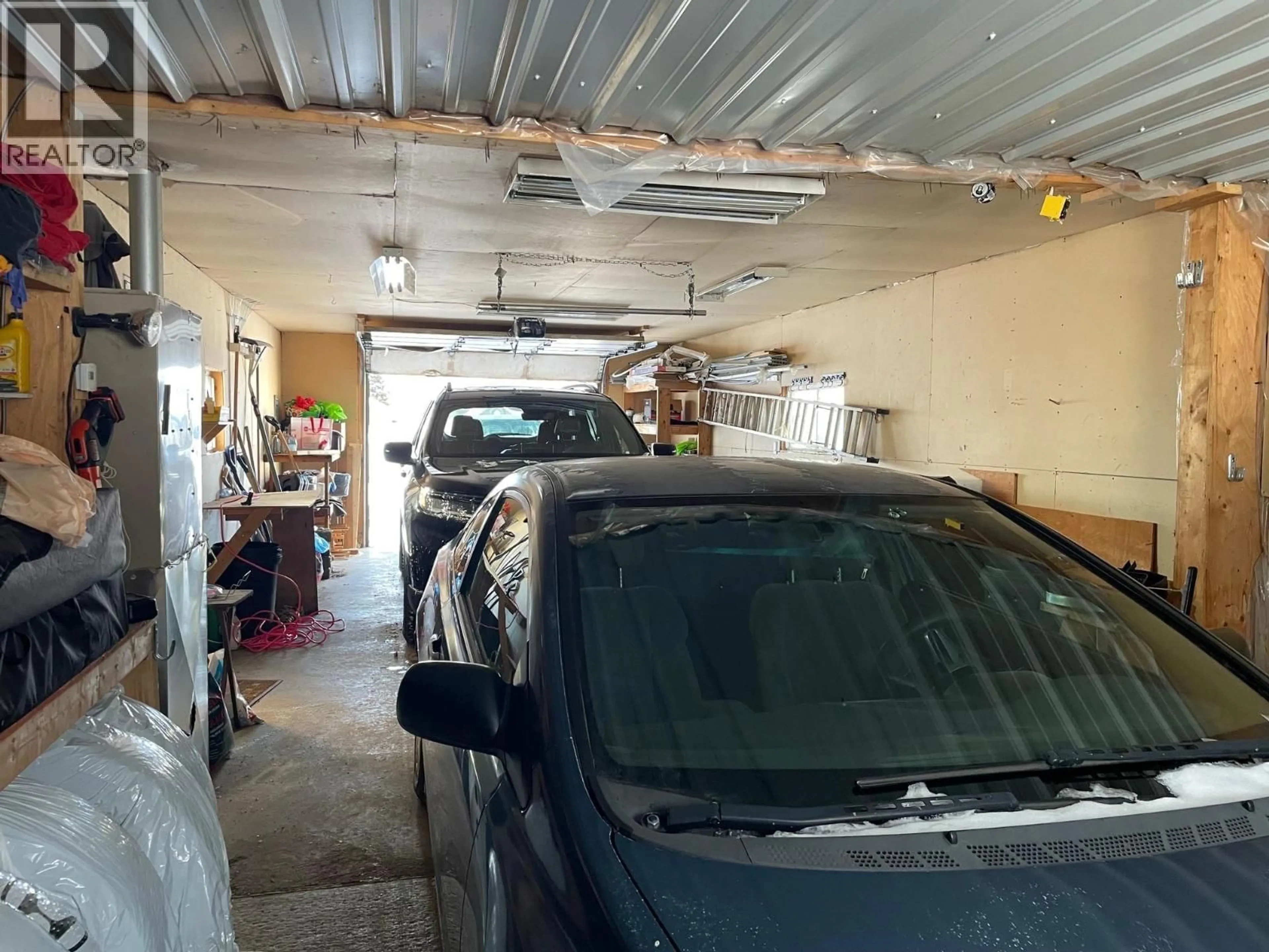 Indoor garage for 5548 MINNAKER CRESCENT, Fort Nelson British Columbia V0C1R0