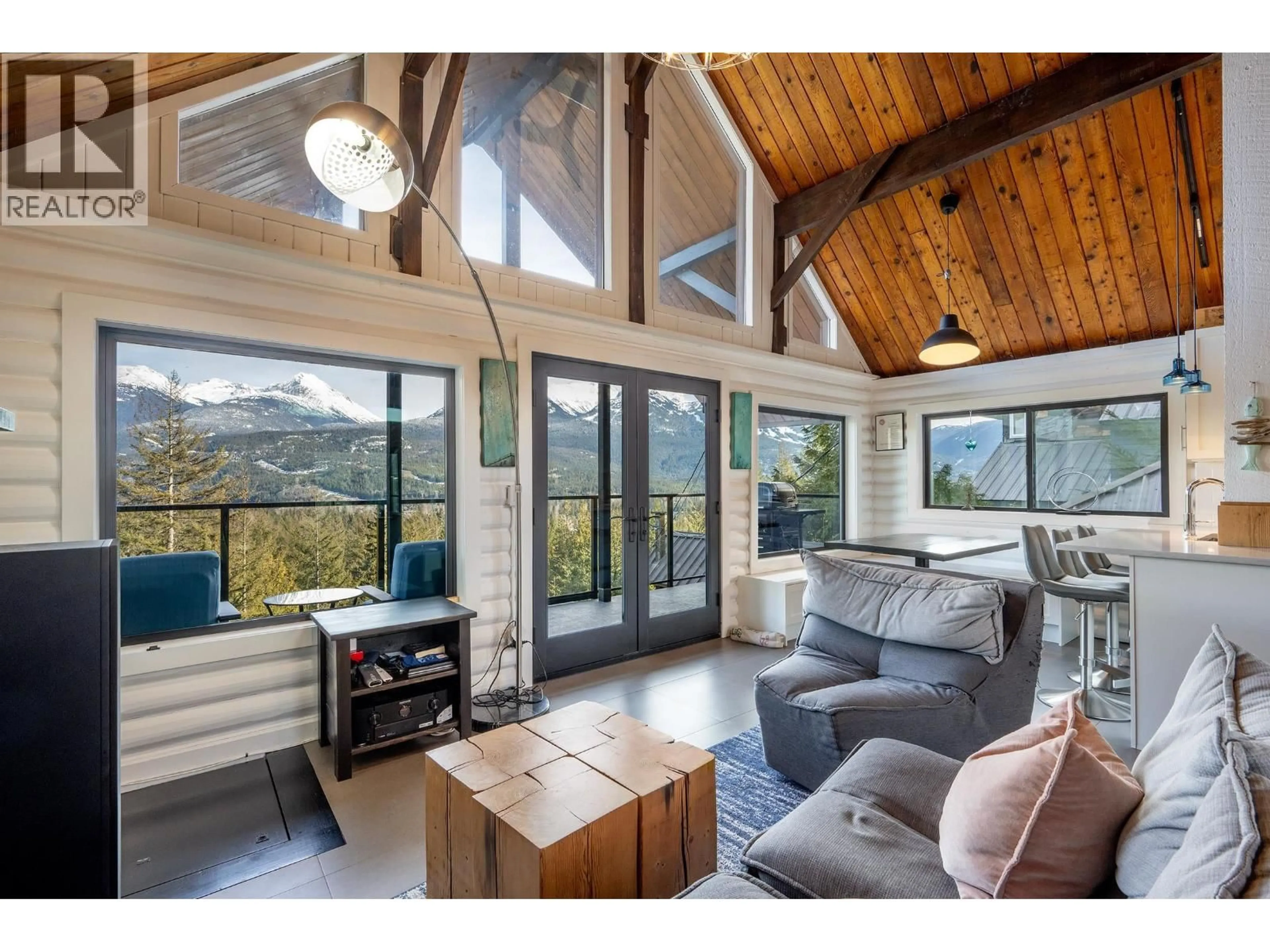 Living room with furniture, wood/laminate floor for 8706 WEDGEVIEW PLACE, Whistler British Columbia V8E0G1
