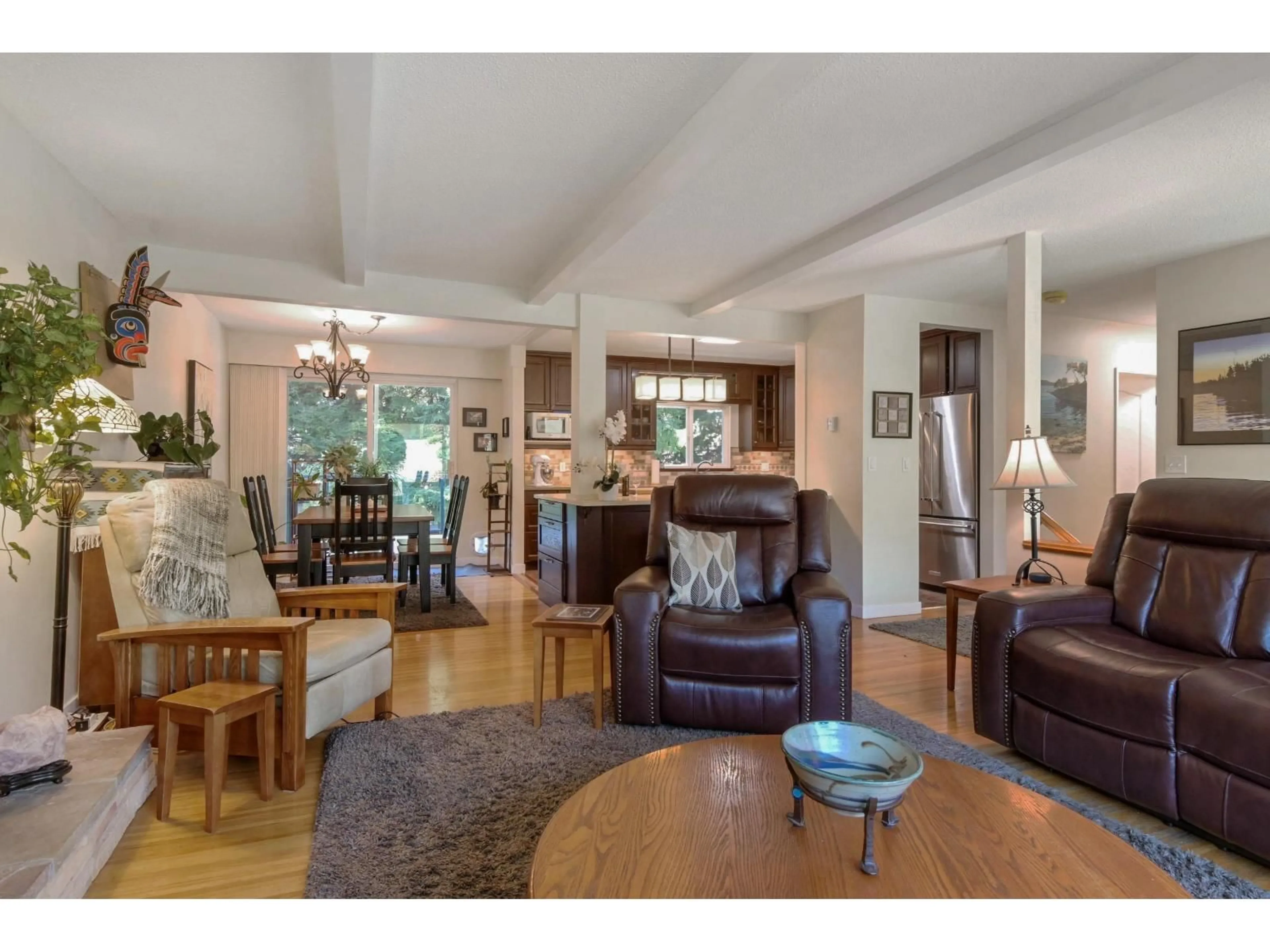 Living room with furniture, wood/laminate floor for 1857 126 STREET, Surrey British Columbia V4A3P4