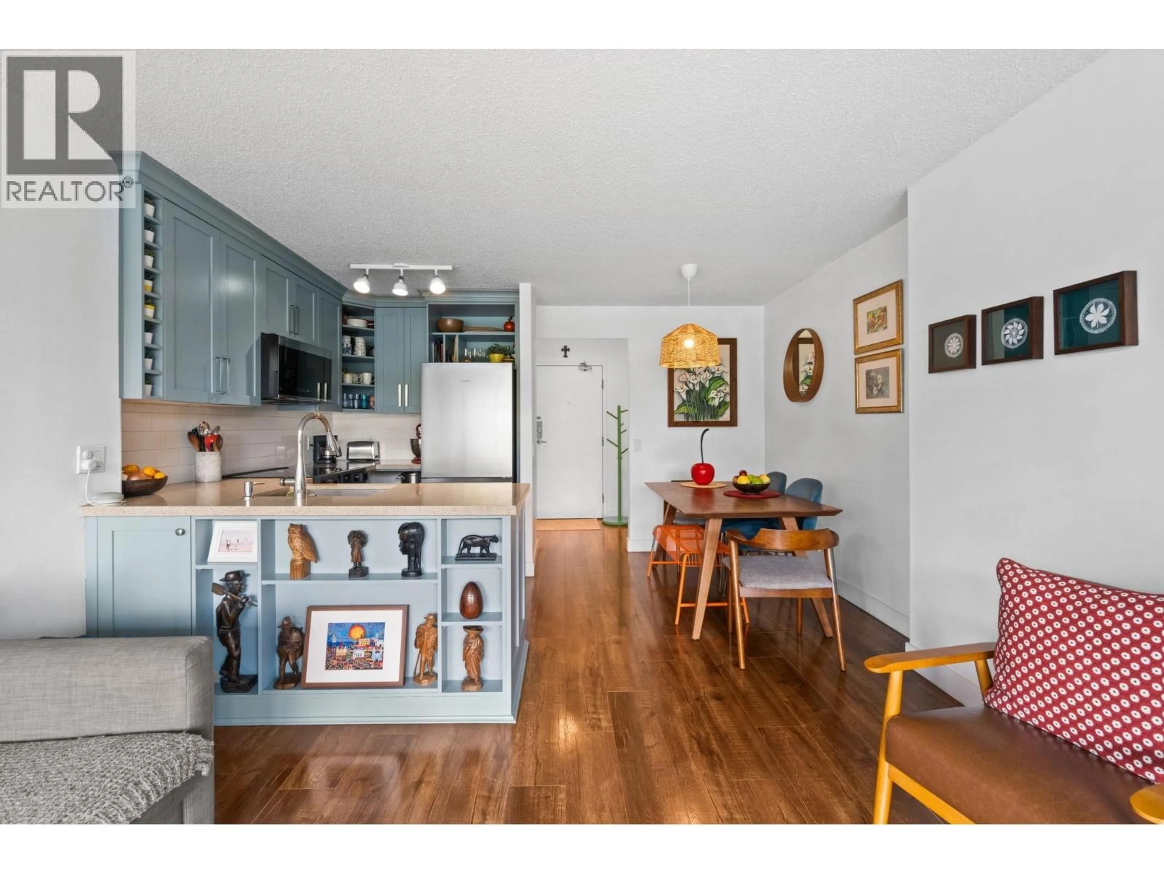 Open concept kitchen, wood/laminate floor for 607 - 3970 CARRIGAN COURT, Burnaby British Columbia V3N4S5