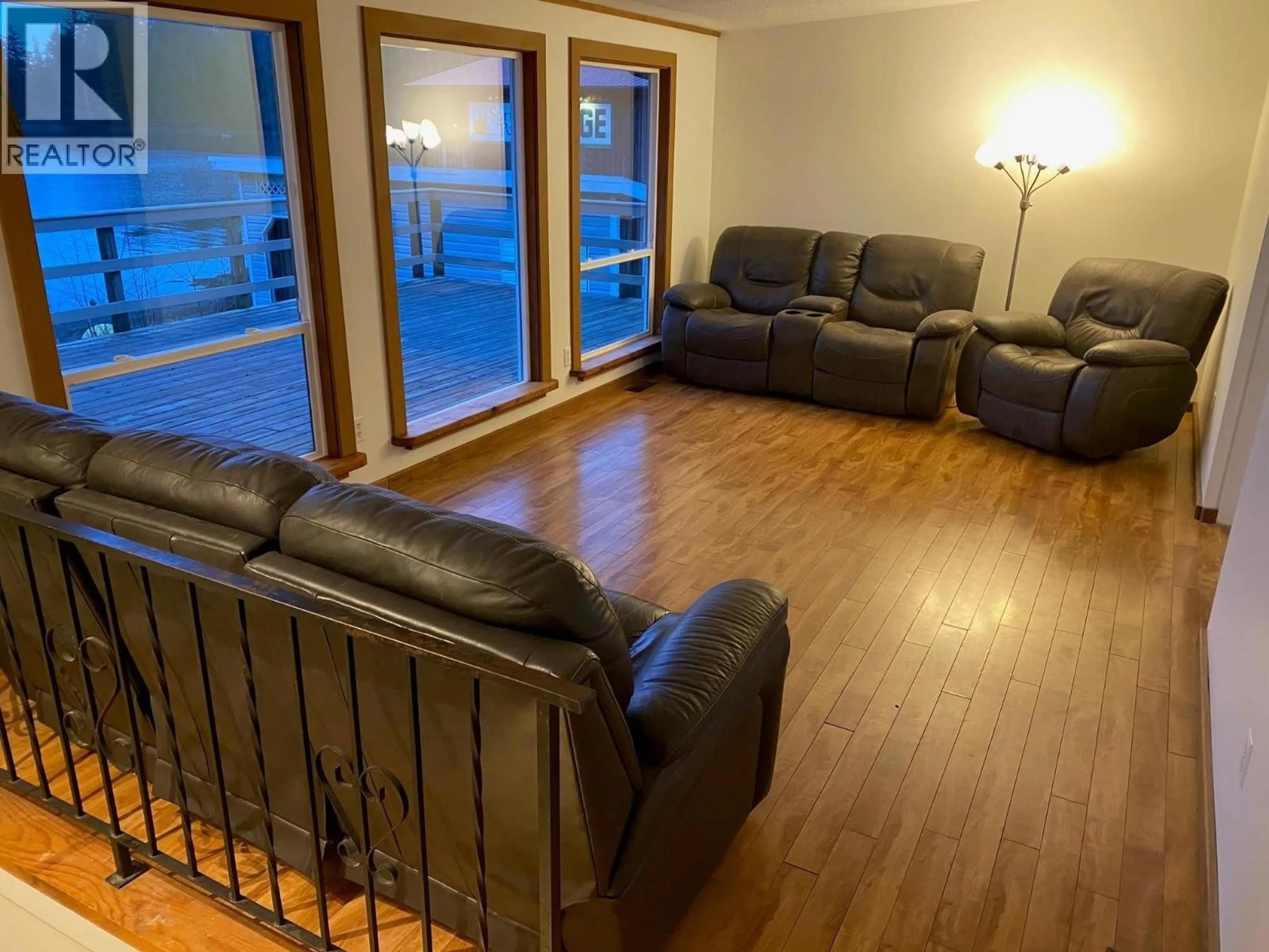 Living room with furniture, wood/laminate floor for 614 5TH AVENUE, Daajing Giids City British Columbia V0T1S0