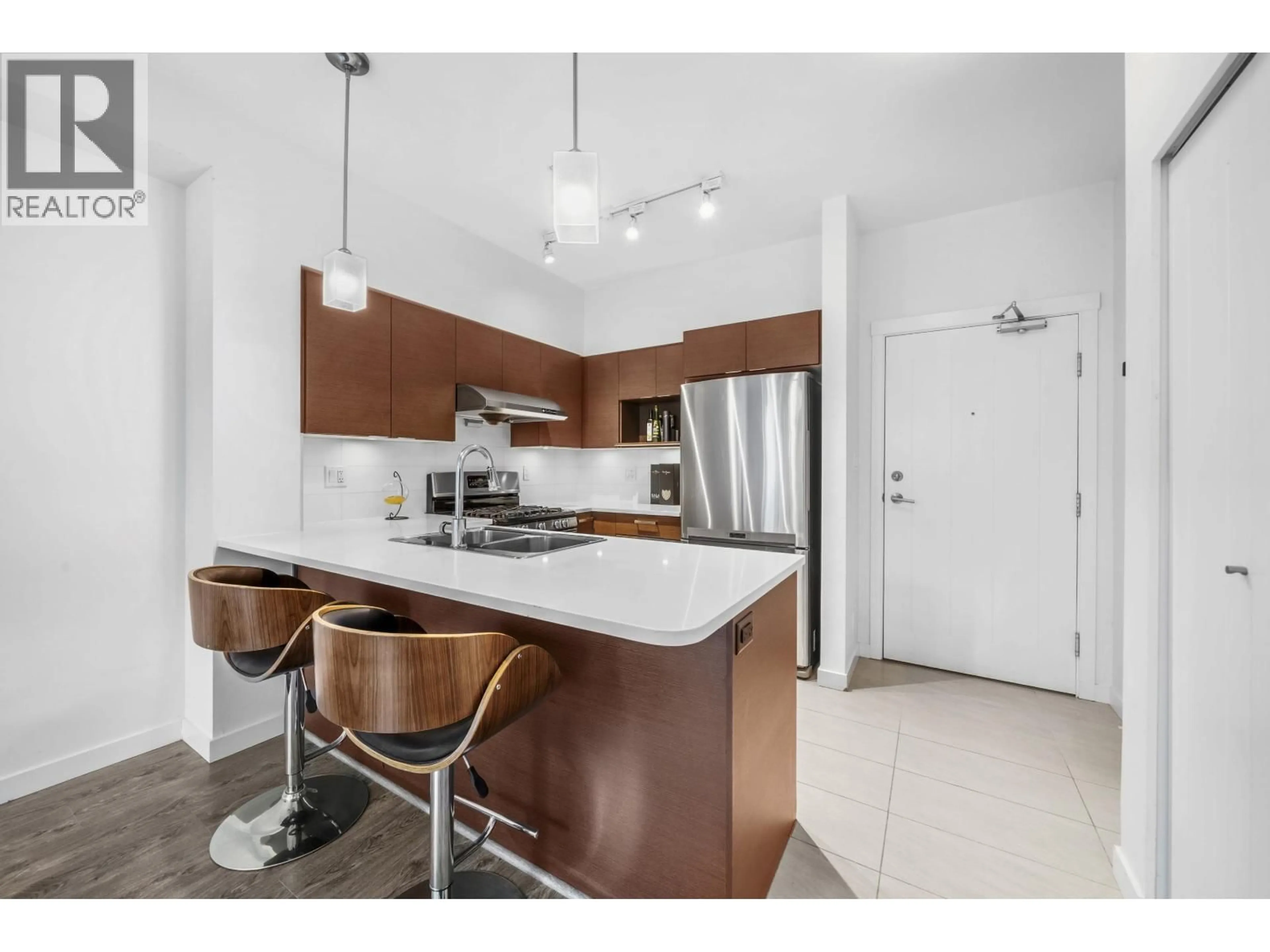Open concept kitchen, ceramic/tile floor for 222 - 10880 NO. 5 ROAD, Richmond British Columbia V6W0B3