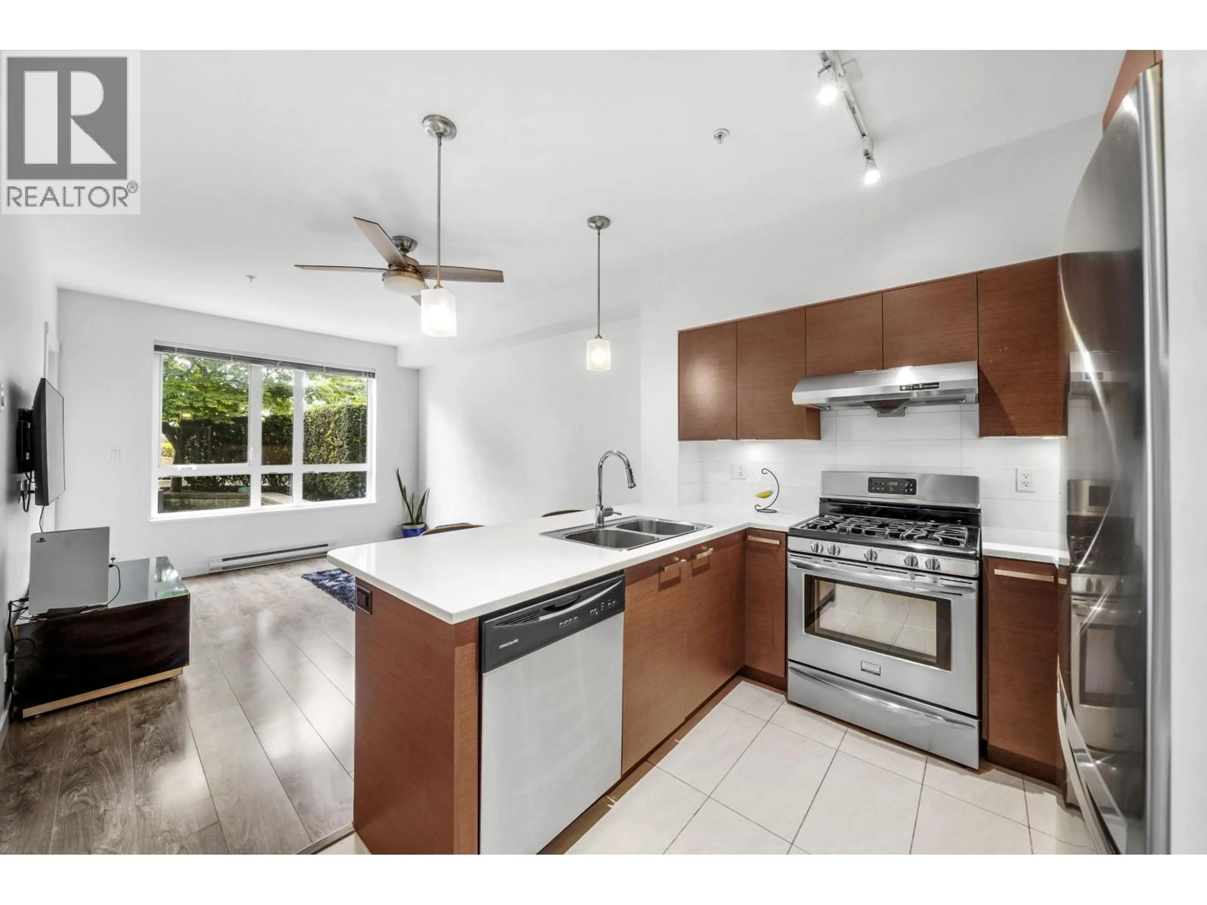 Open concept kitchen, ceramic/tile floor for 222 - 10880 NO. 5 ROAD, Richmond British Columbia V6W0B3
