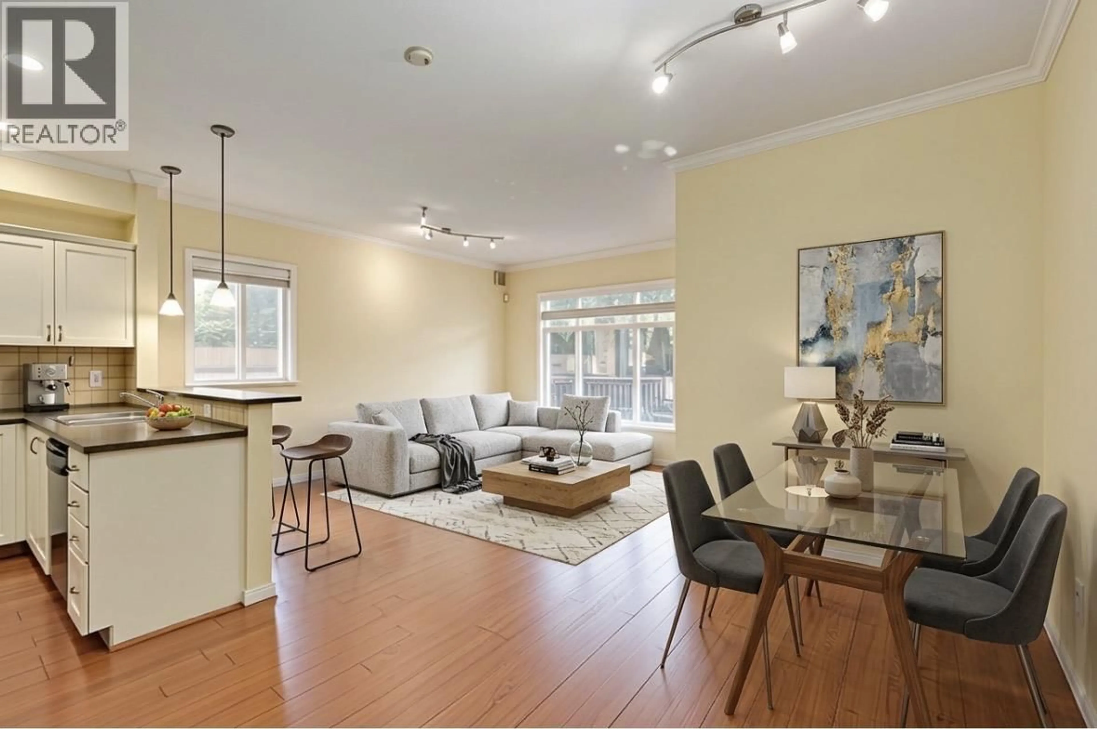 Living room with furniture, wood/laminate floor for 11 - 7788 ASH STREET, Richmond British Columbia V6Y2S1