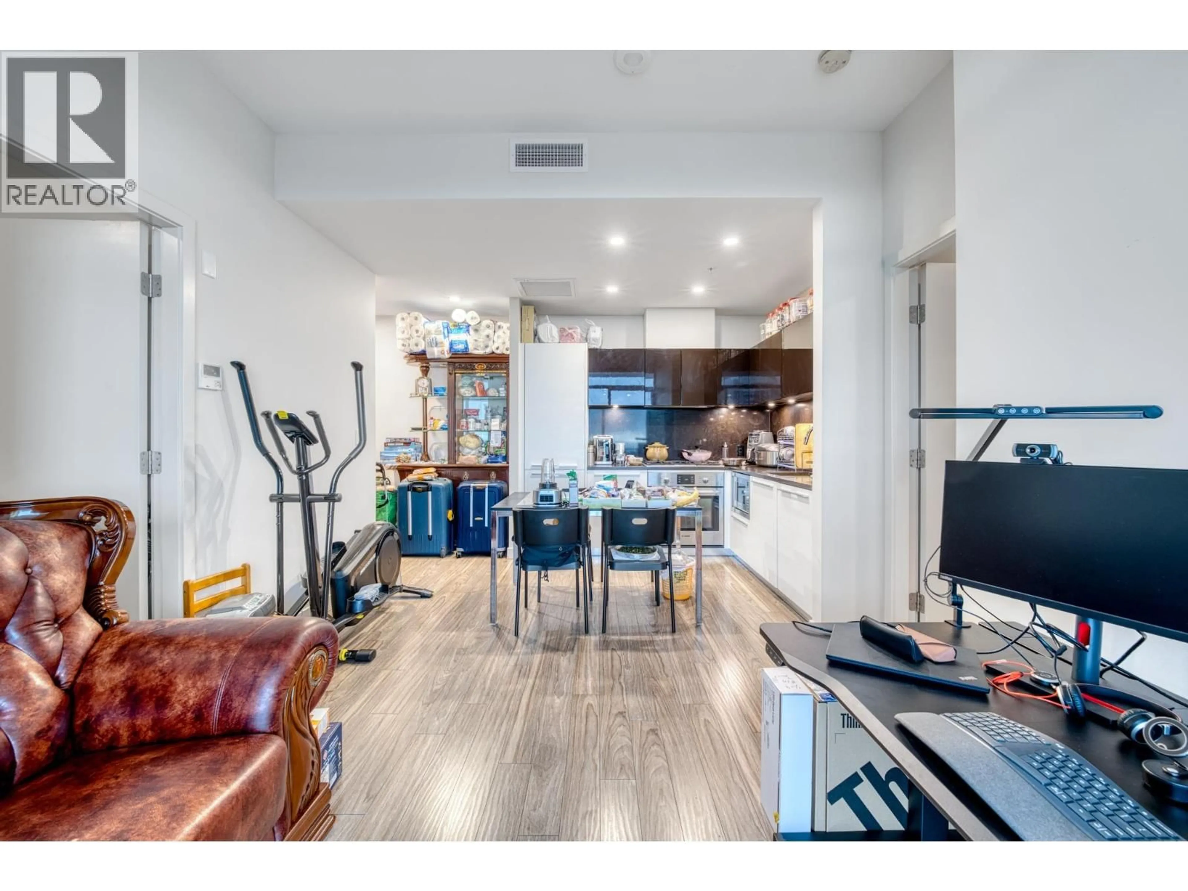 Open concept kitchen, wood/laminate floor for 3104 - 6383 MCKAY AVENUE, Burnaby British Columbia V5H0H8