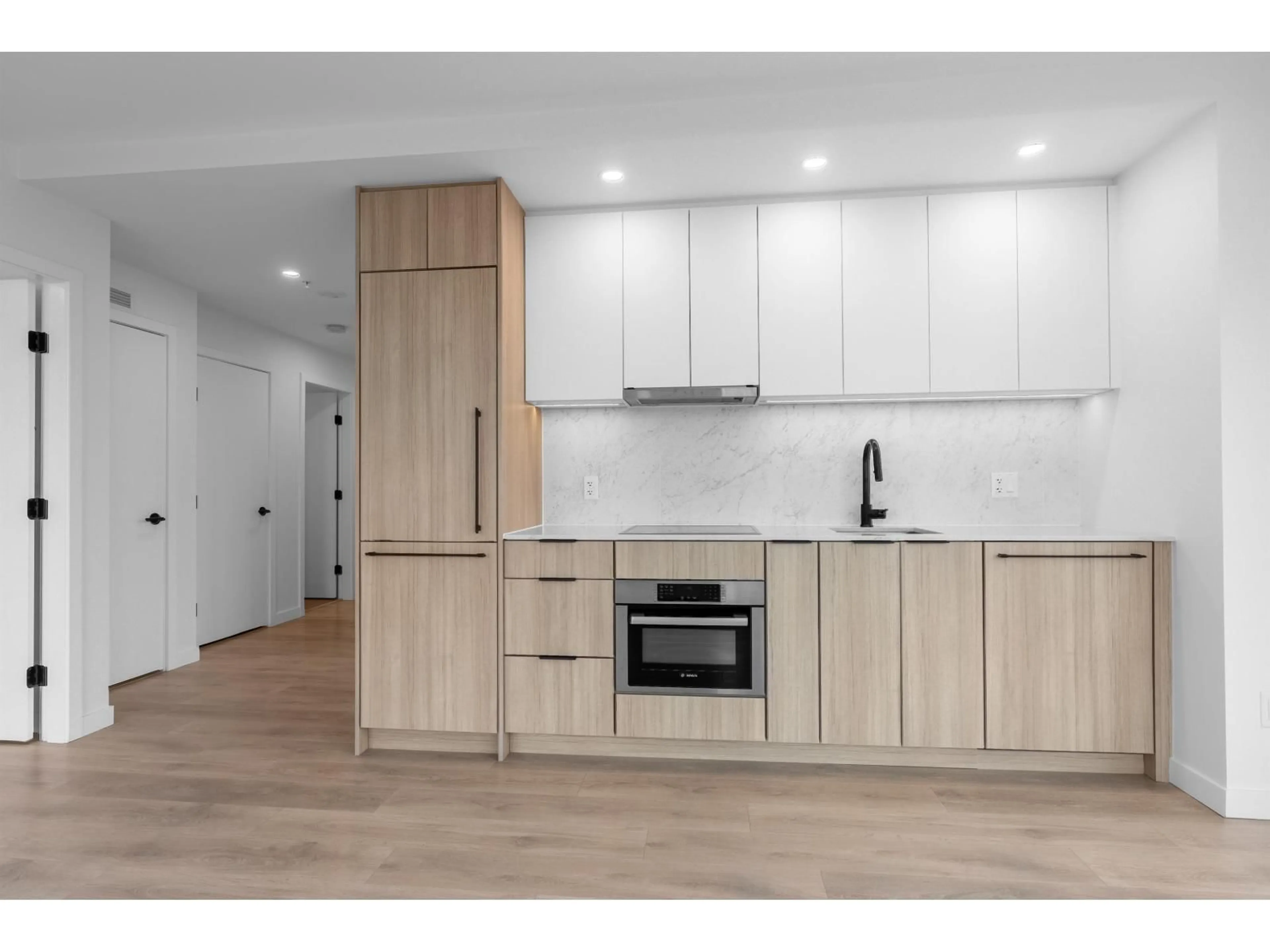Open concept kitchen, wood/laminate floor for 1108 - 13685 102 AVENUE, Surrey British Columbia V3T1N7