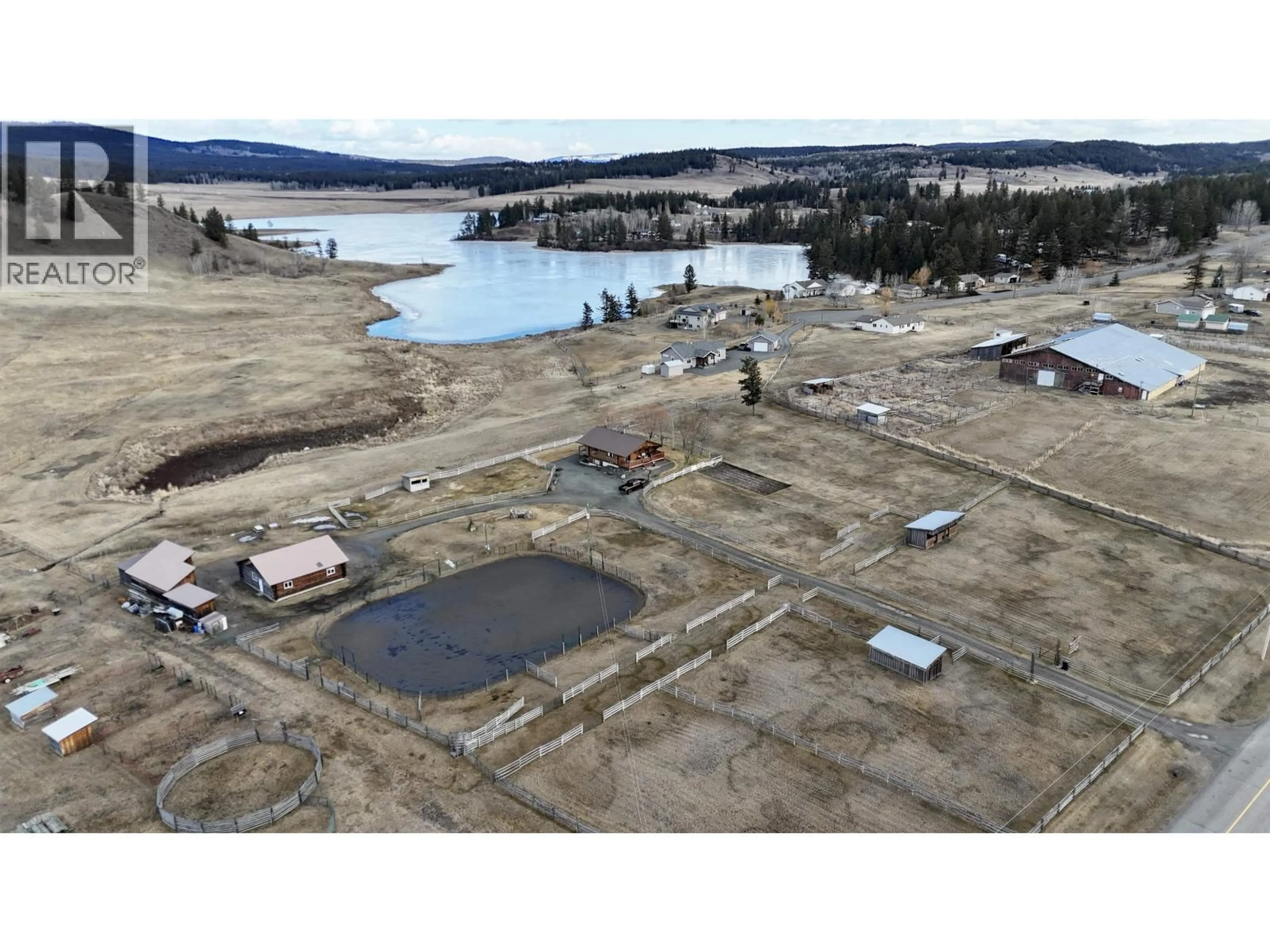 A pic from outside/outdoor area/front of a property/back of a property/a pic from drone, water/lake/river/ocean view for 5393 TATTON STATION ROAD, 100 Mile House British Columbia V0K2E1