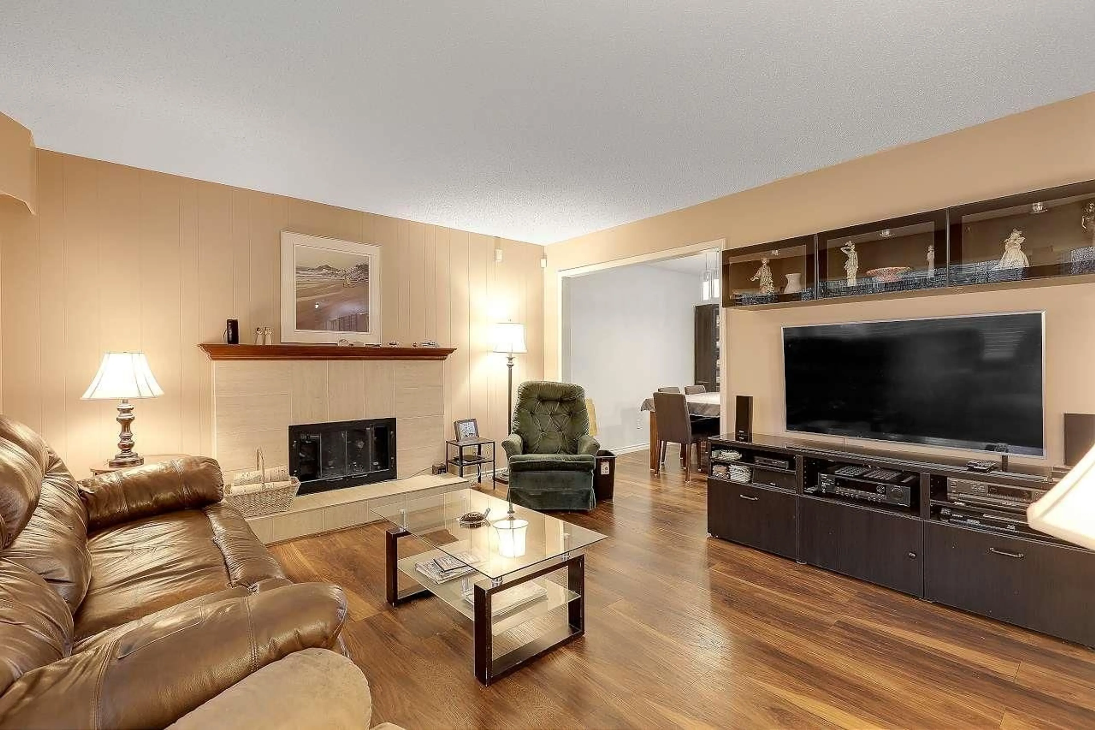 Living room with furniture, wood/laminate floor for 14415 114 AVENUE, Surrey British Columbia V3R2M7